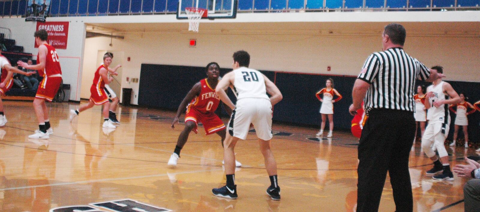 Fenwick’s Caleb Davis (0) defends Edgewood’s Logan Loftus (20) during Tuesday night’s game at Ron Kash Court in St. Clair Township. Fenwick won 48-38. RICK CASSANO/STAFF