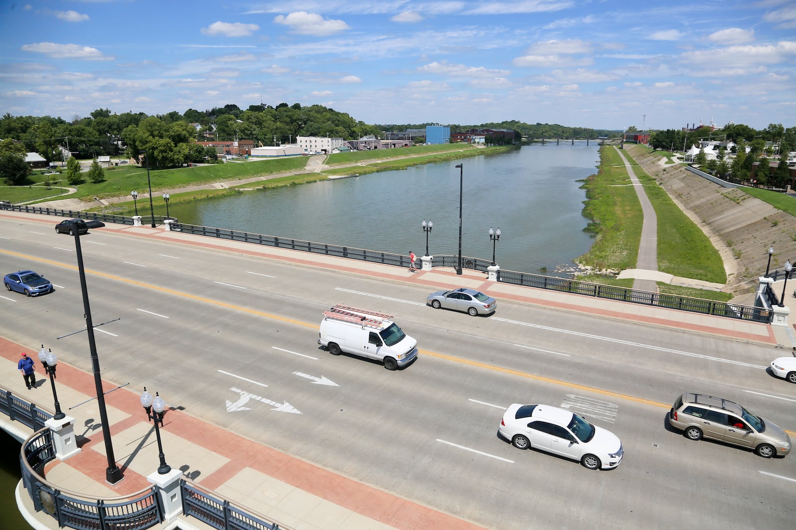 In September, tables will be set up along the northern edge of the High-Main Bridge that links the West Side with the East Side — with two-way traffic maintained on two lanes instead of four — so people can hang out and eat and drink, thanks to the Downtown Outdoor Refreshment Area.