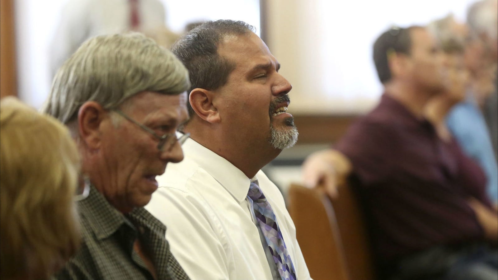 Jeff Fuller weeps as a guilty verdict is announced against his brother-in-law, Todd Mullis, Monday, Sept. 23, 2019. Mullis, 43, was found guilty of impaling 39-year-old Amy Mullis with a corn rake Nov. 10, 2018, on their Earlville, Iowa farm.T