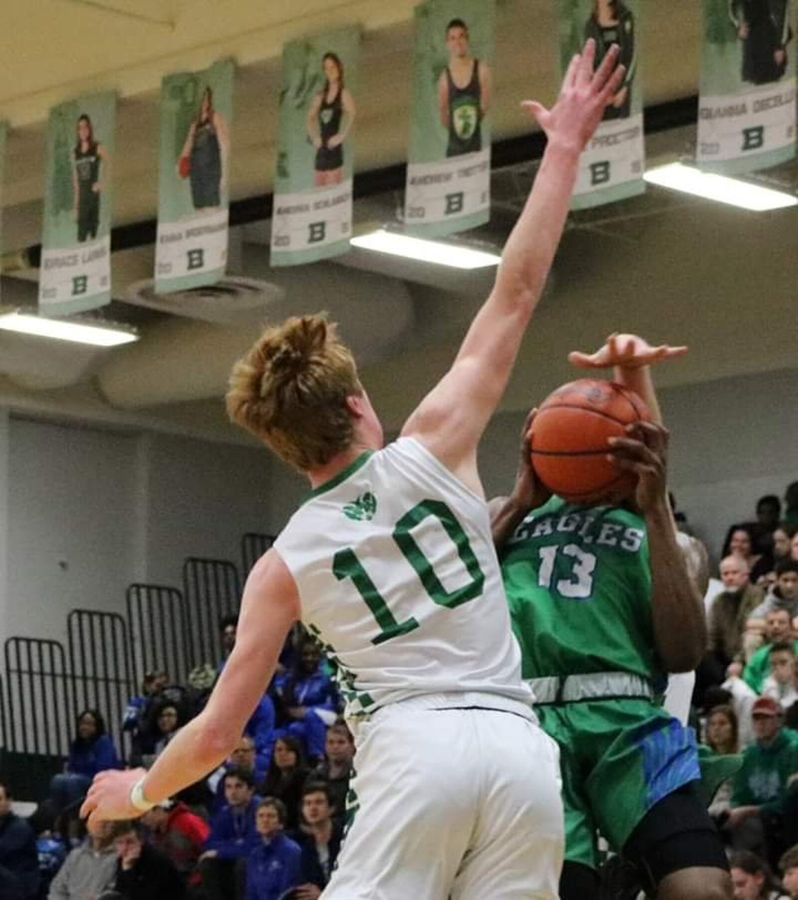 Chaminade Julienne’s Brandon Gibson (13) is caught between Badin’s Zach Switzer (10) and an unidentified BHS defender during Friday night’s game at Mulcahey Gym in Hamilton. CJ won 58-54. CONTRIBUTED PHOTO BY TERRI ADAMS