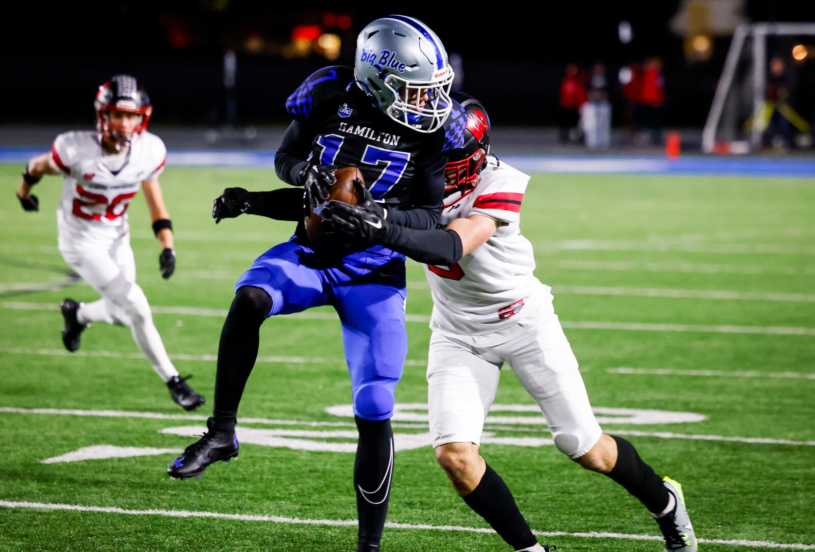 Hamilton's Cairon Navey makes a catch during their football game against Lakota West Friday, Oct. 20, 2023 at Virgil M. Schwarm Stadium in Hamilton. Lakota West won 42-14. NICK GRAHAM/STAFF