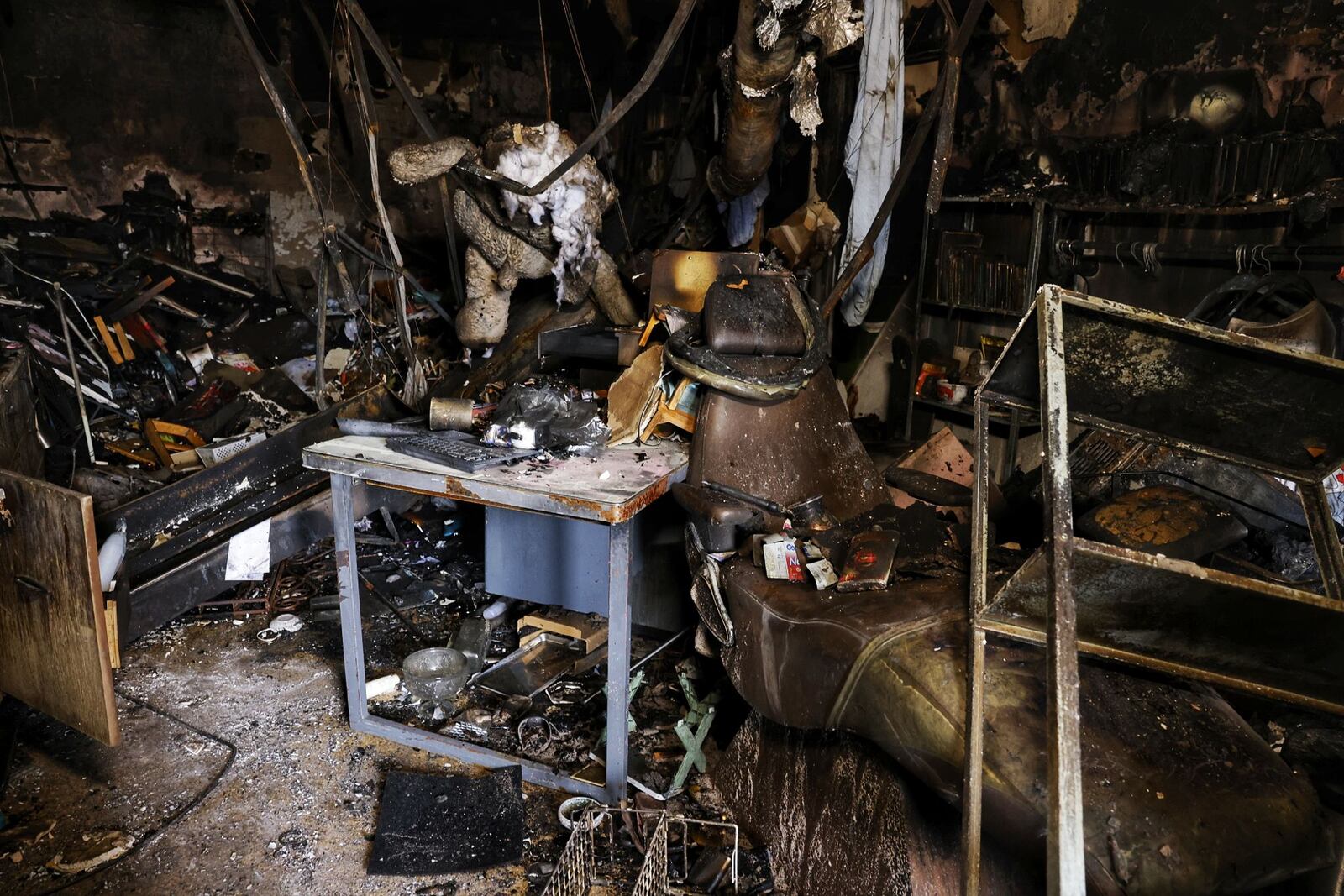 A fire destroyed Lucid Ink Tattoo and attached apartments on Millard Dr. in Franklin. Residents were able to escape but a cat, Toriyama, died in the fire. NICK GRAHAM/STAFF