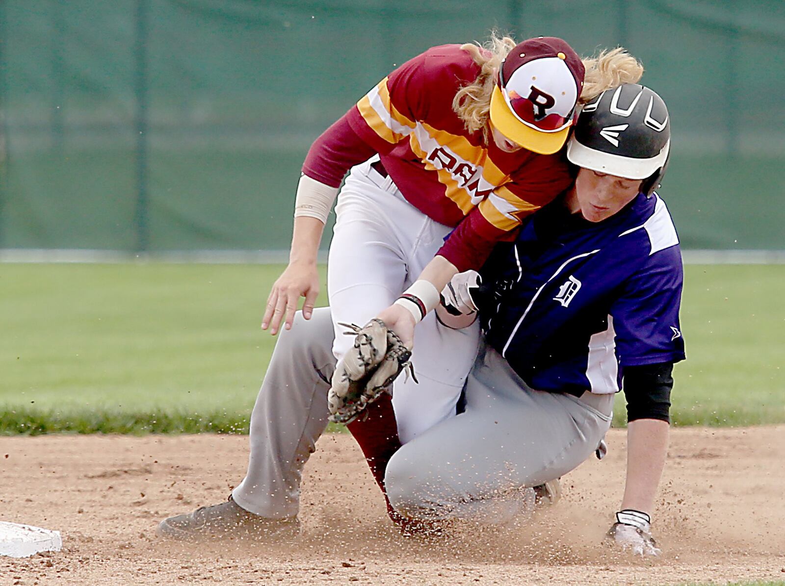 Drew McLuckie of Columbus DeSales collides with Ross shortstop Tyler Flick and is safe at second base during Friday’s Division II regional semifinal at Mason. CONTRIBUTED PHOTO BY E.L. HUBBARD