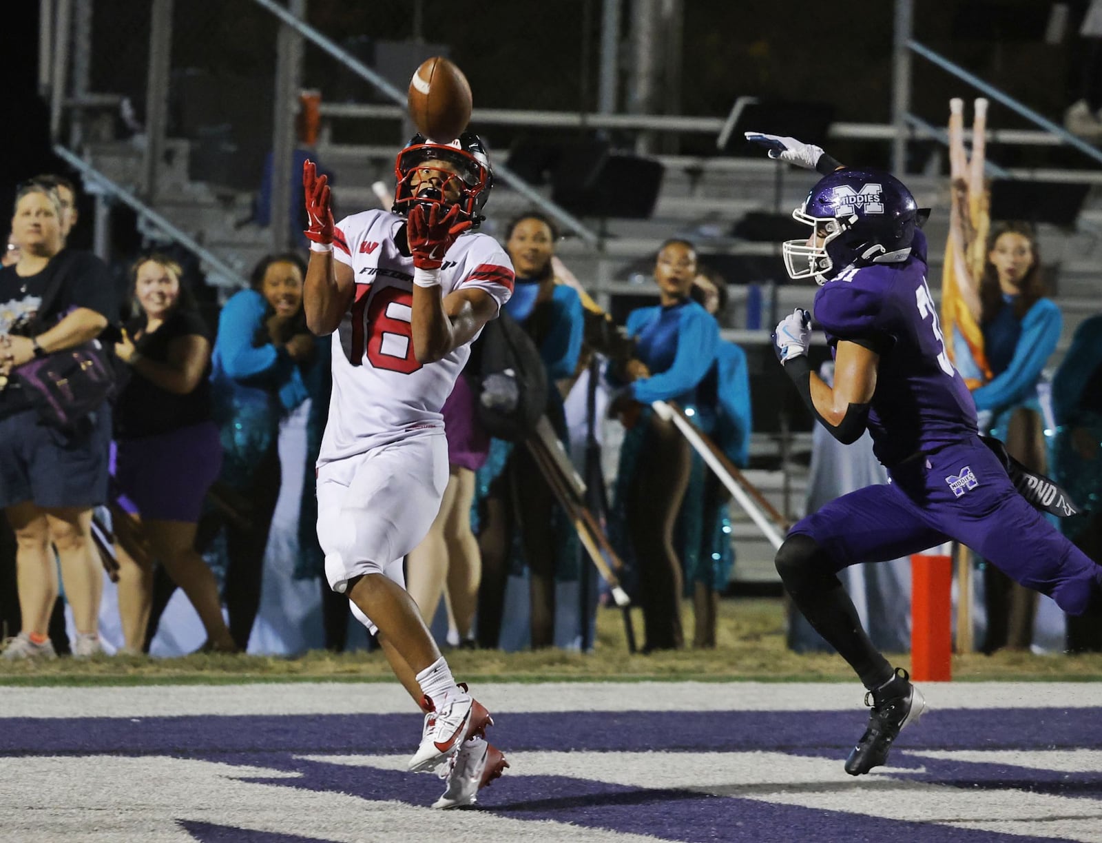 Lakota West's Tyson Davis prepares to catch a touchdown pass against Middletown on Friday night. Nick Graham/STAFF