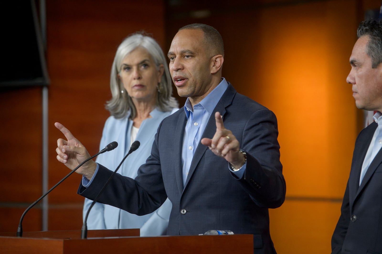 House Minority Leader Hakeem Jeffries, D-N.Y., center, is joined by House Minority Whip Katherine Clark, D-Mass., left, and House Democratic Caucus Chair Pete Aguilar, D-Calif., right, during a news conference at the Capitol, Friday, March 14, 2025, in Washington. (AP Photo/Rod Lamkey, Jr.)