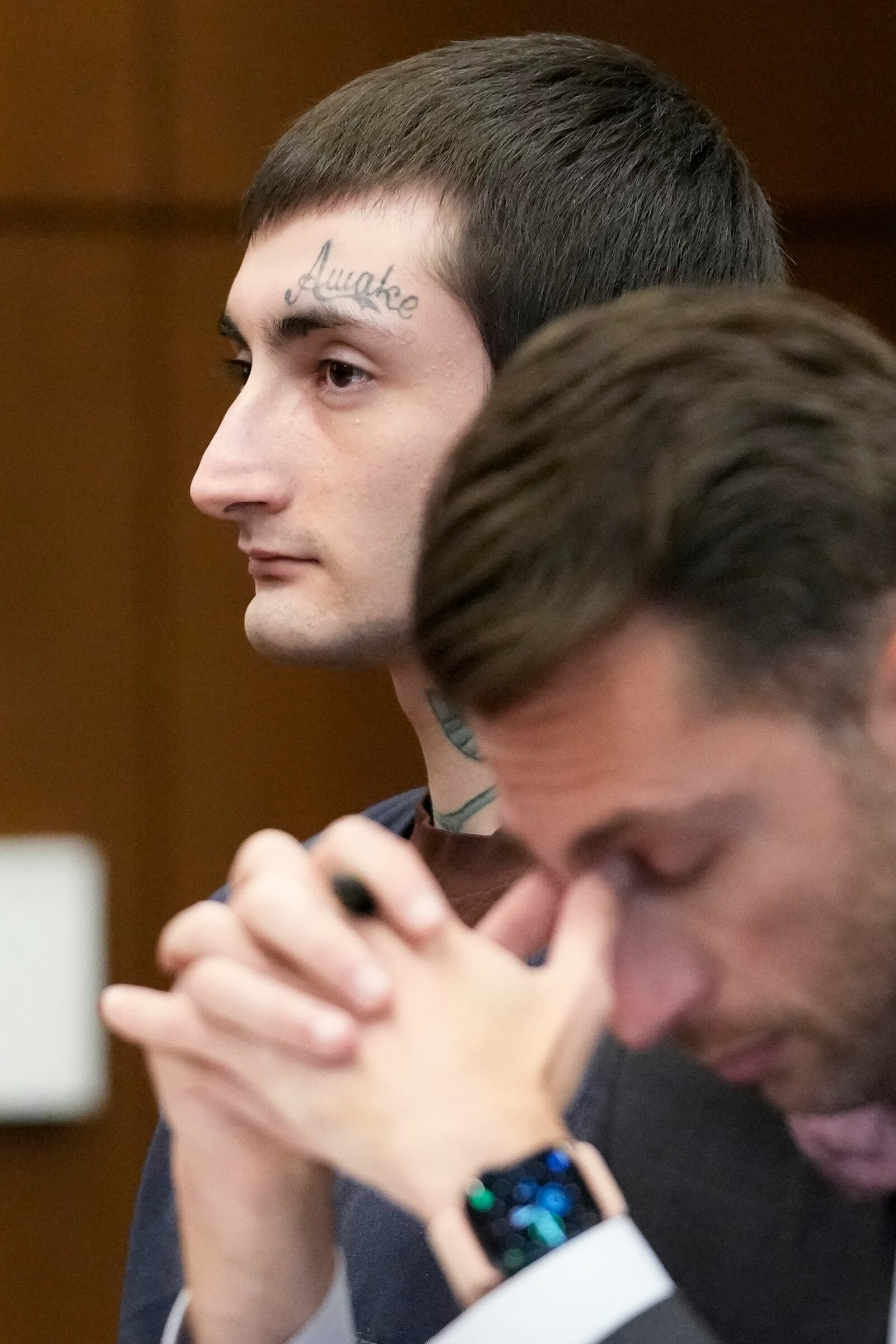 Robert E. Crimo III, left, and Lake County's assistant public defender Anton Trizna listen to Judge Victoria A. Rossetti during case management and ruling on motions at the Lake County Courthouse, Waukegan, Ill., Wednesday, Dec. 18, 2024. (AP Photo/Nam Y. Huh, Pool)