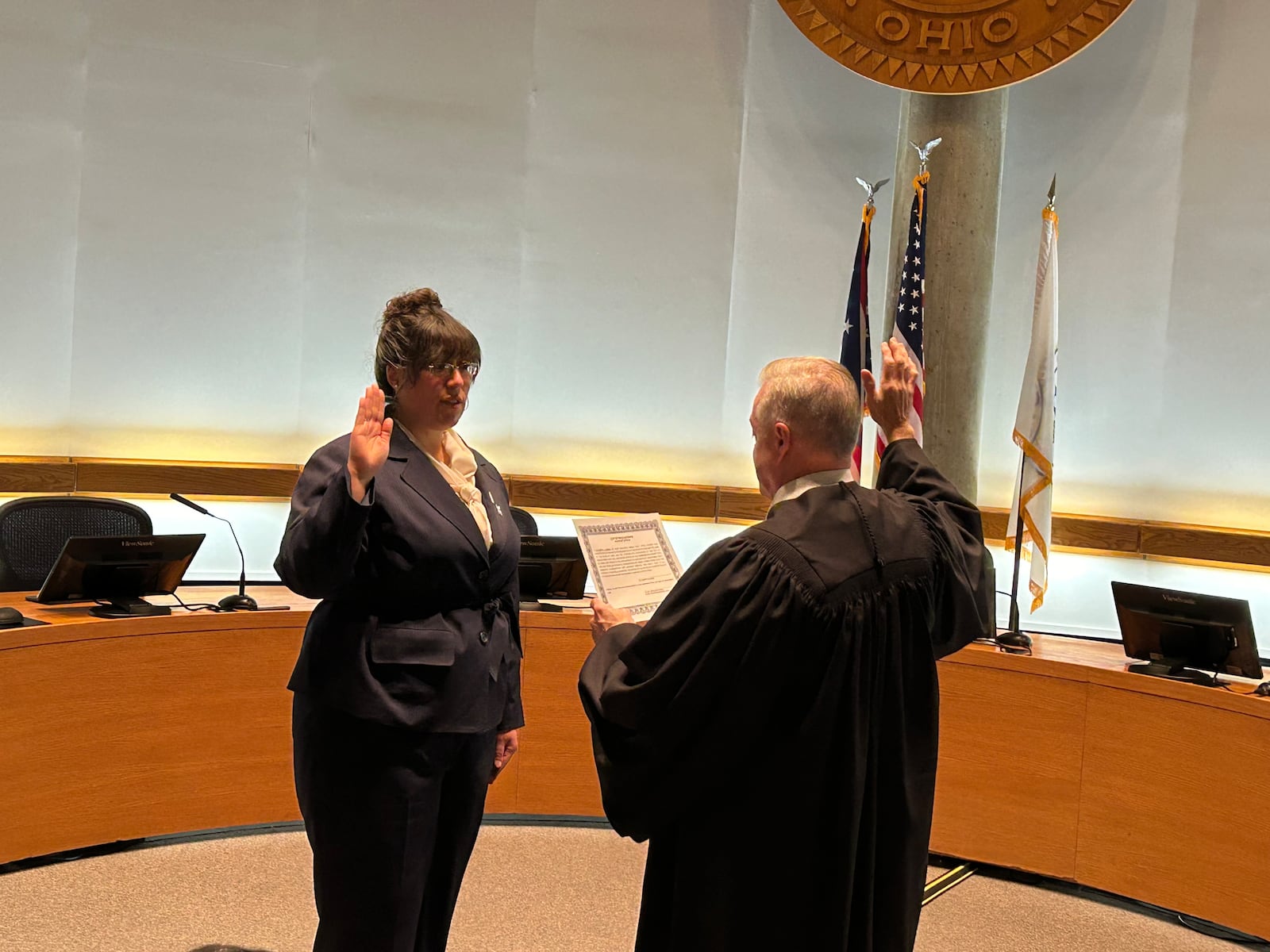 Elizabeth Slamka is sworn-in Tuesday night as Middletown mayor by Municipal Court Judge James Sherron. RICK McCRABB/STAFF