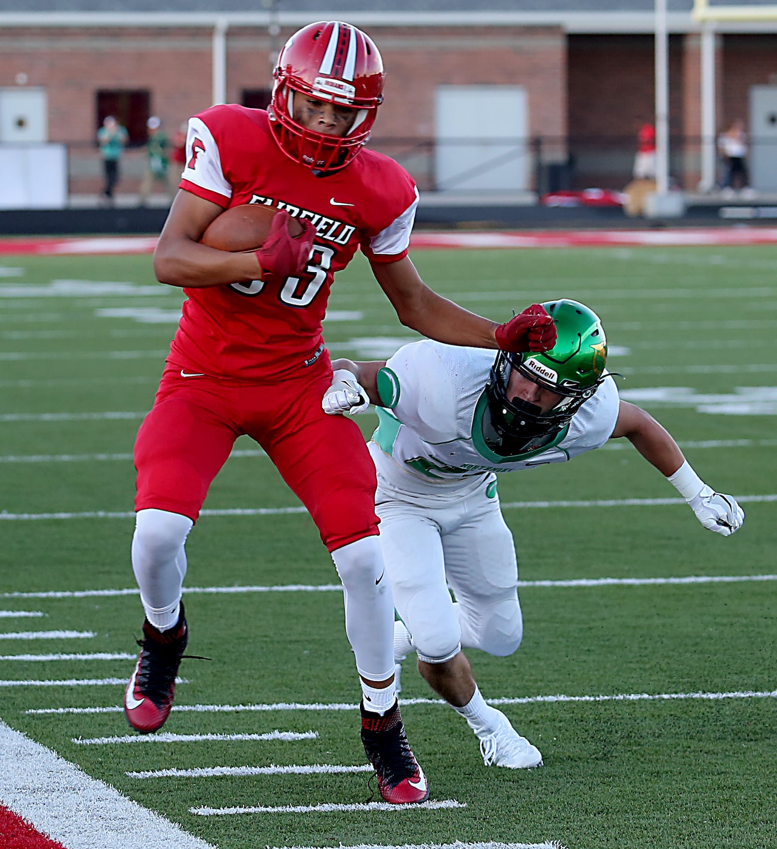 Contributed photo by E.L. Hubbard Fairfield wide receiver Erick All is forced out of bounds by Northmont defensive back Garrett McGough during their game at Fairfield Stadium Friday, Sept. 2, 2016.