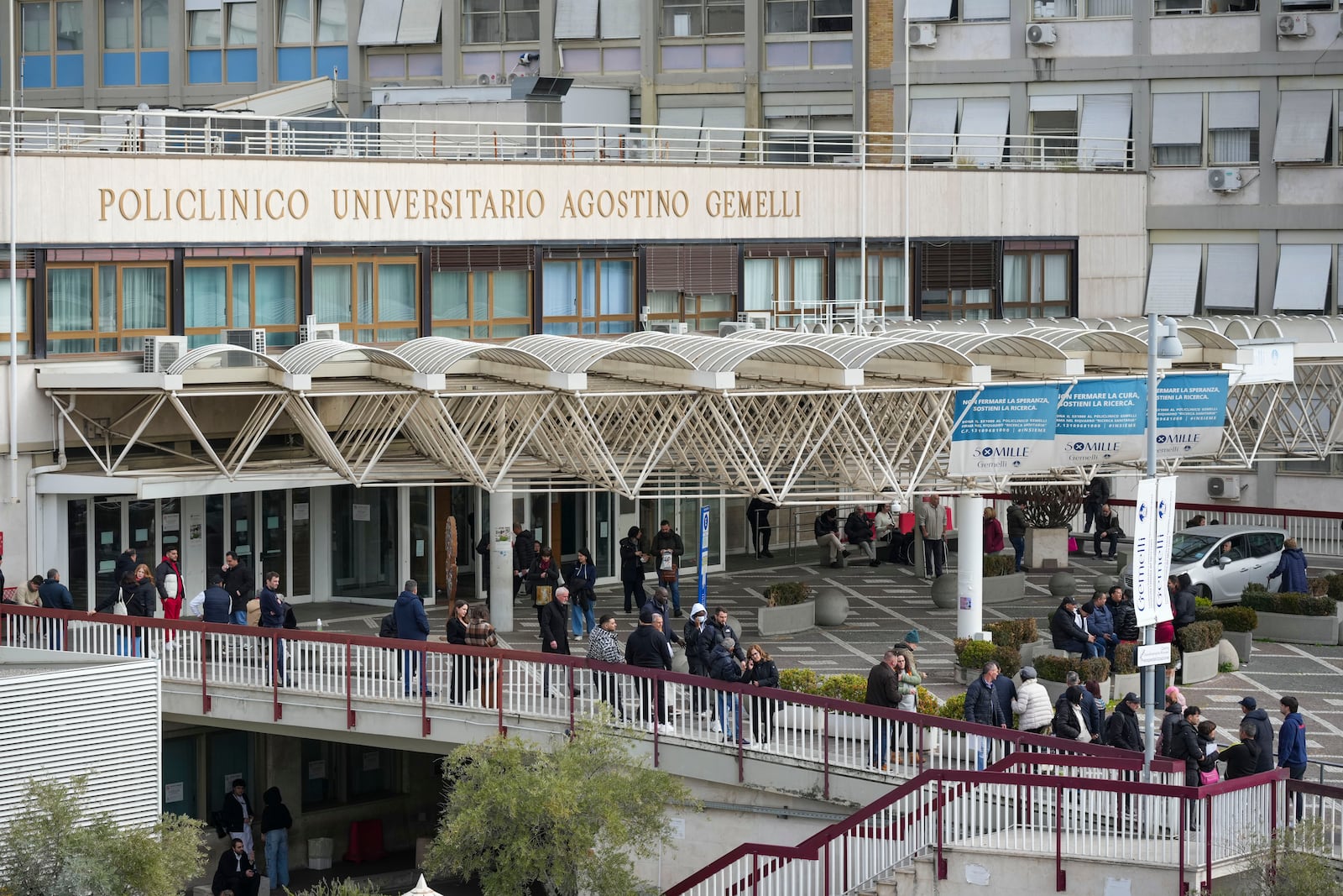 A view of the main entrance of the Agostino Gemelli Polyclinic, in Rome, Monday, Feb. 17, 2025, where Pope Francis has been hospitalized to undergo some necessary diagnostic tests and to continue his ongoing treatment for bronchitis. (AP Photo/Andrew Medichini)