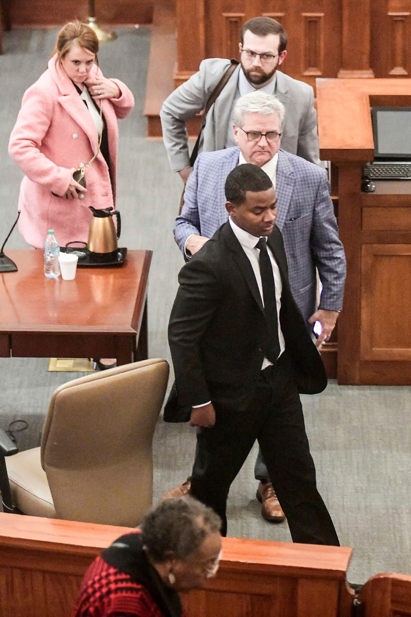 Sheldon "Timothy" Herrington Jr., foreground, who was on trial for the murder of University of Mississippi student Jimmie "Jay" Lee, and his defense team leave court after a mistrial was declared, at the Lafayette County Courthouse in Oxford, Miss. on Wednesday, Dec. 11, 2024. (Bruce Newman/The Northeast Mississippi Daily Journal, via AP, Pool)