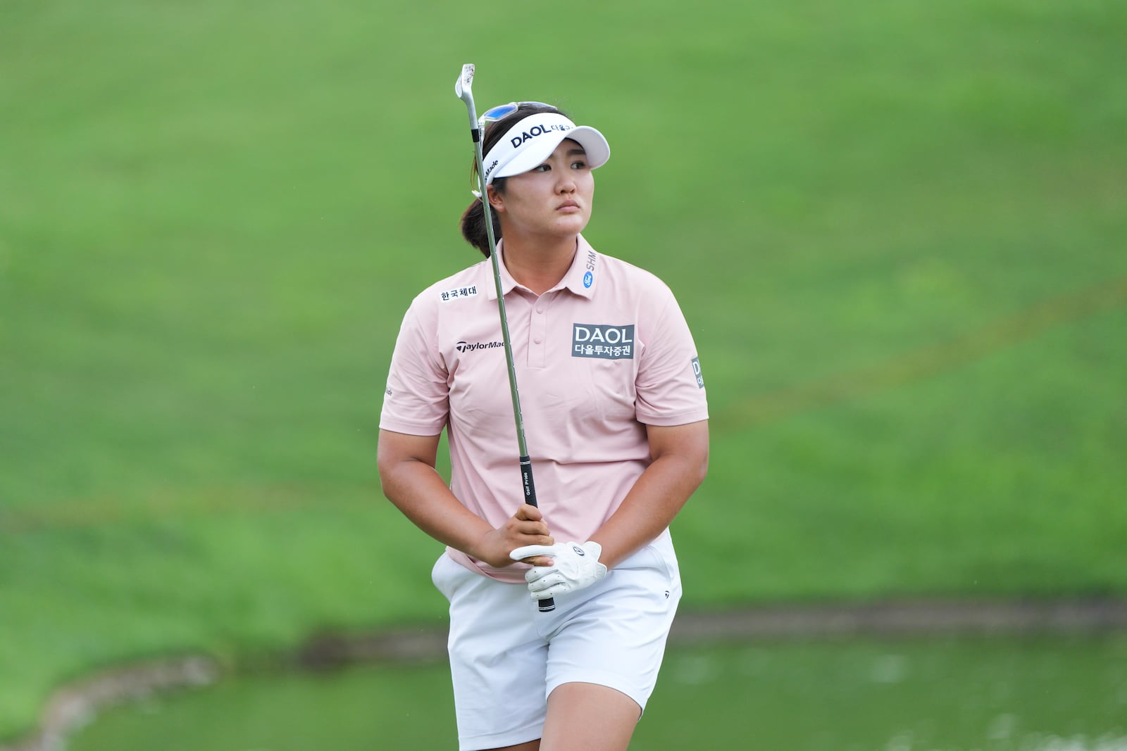 Ryu Haeran of South Korea's, watches her fairway shot on the 14th hole during the LPGA Tour's Maybank Championship at Kuala Lumpur Golf and Country club in Kuala Lumpur, Sunday, Oct. 27, 2024. (AP Photo/Vincent Thian)