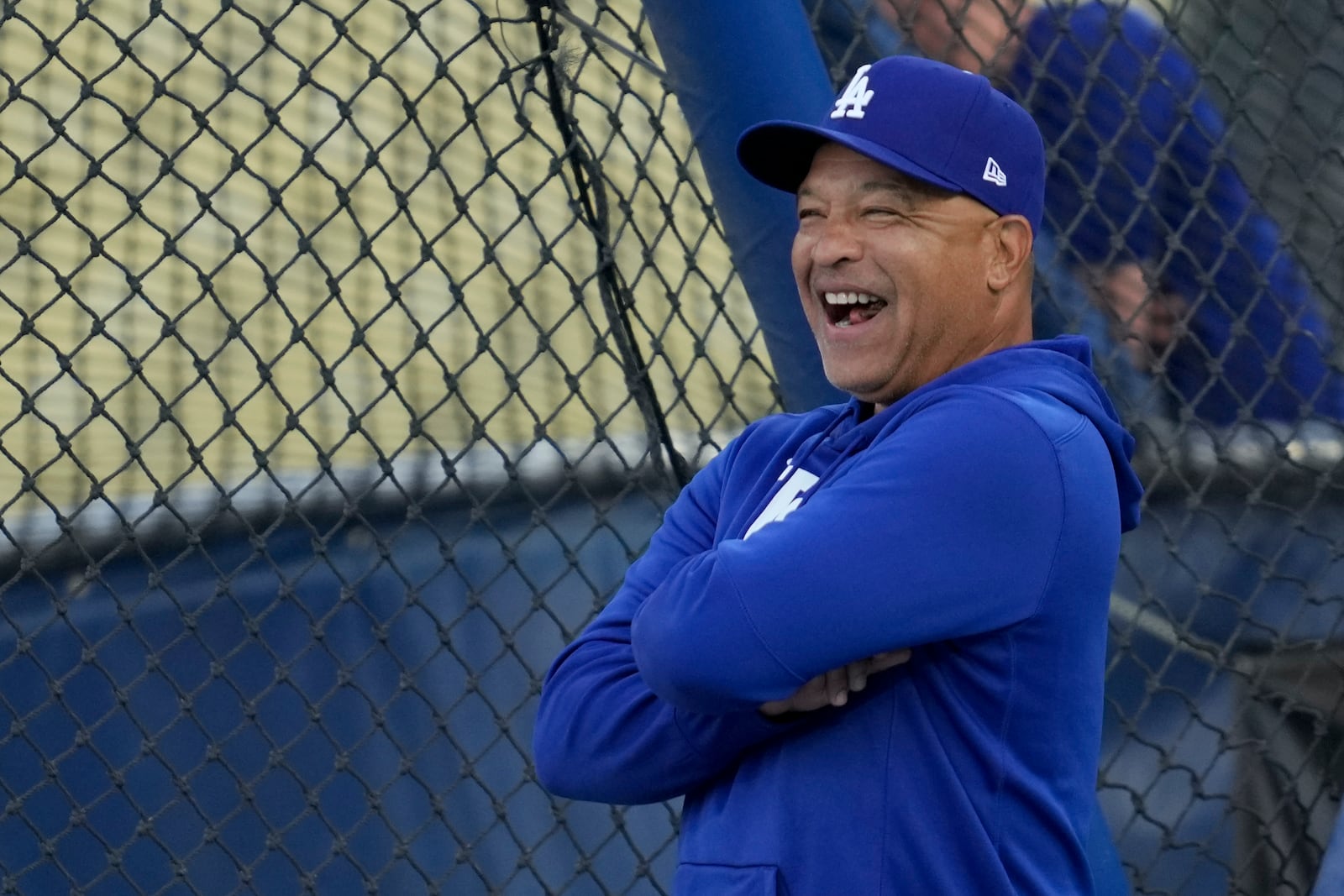 Los Angeles Dodgers manager Dave Roberts reacts during practice ahead of Game 5 of a baseball National League Division Series against the San Diego Padres, Thursday, Oct. 10, 2024, in Los Angeles. (AP Photo/Ashley Landis)