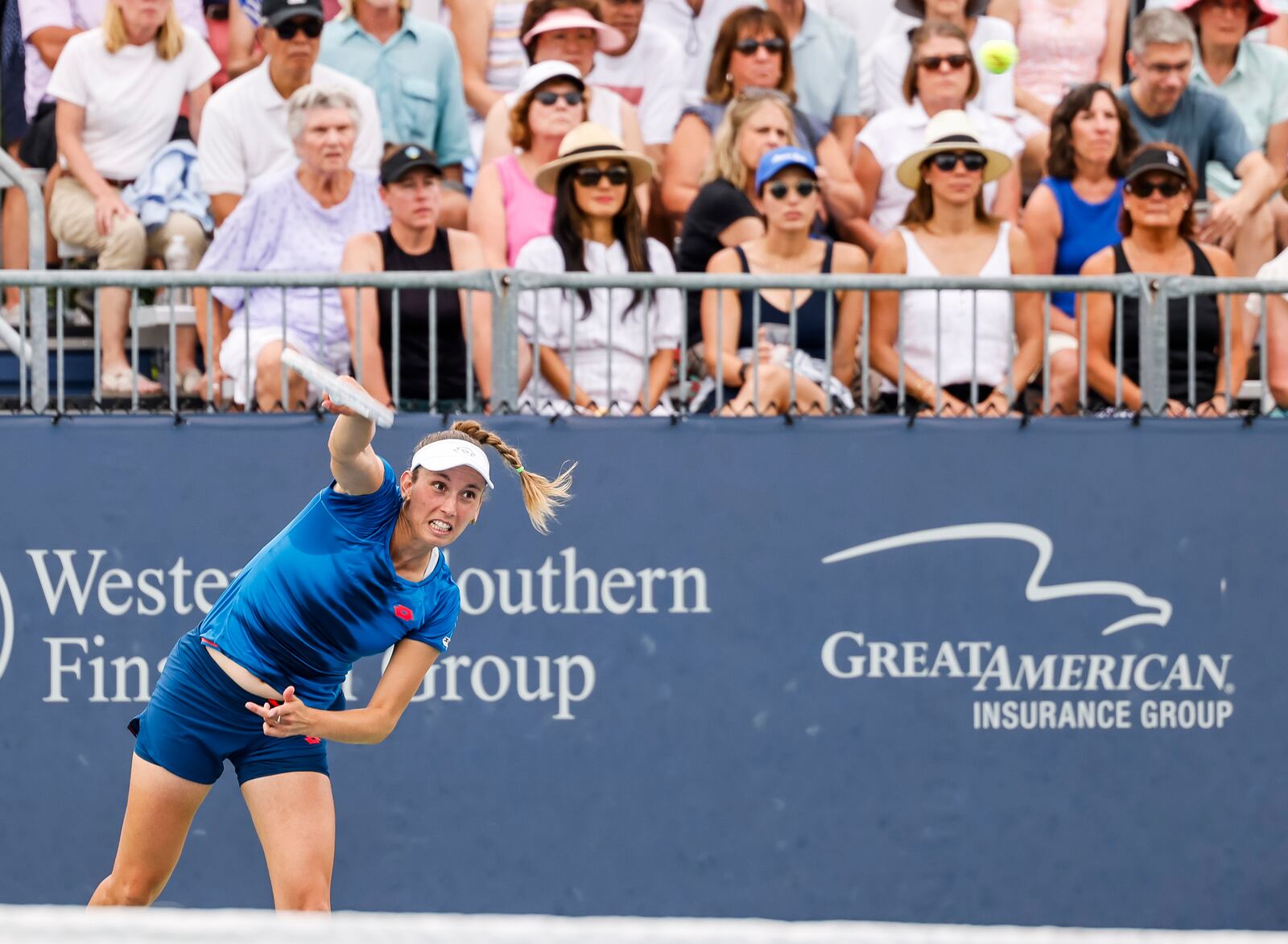 Elise Mertens serves as doubles teammate Su-Wei Hseih waits at the net against Harriet Dart and Ellen Perez at Cincinnati Open tennis tournament Thursday, Aug. 15, 2024 at Lindner Family Tennis Center in Mason. Warren County expects future growth in sales tax from annual tournament. STAFF PHOTO