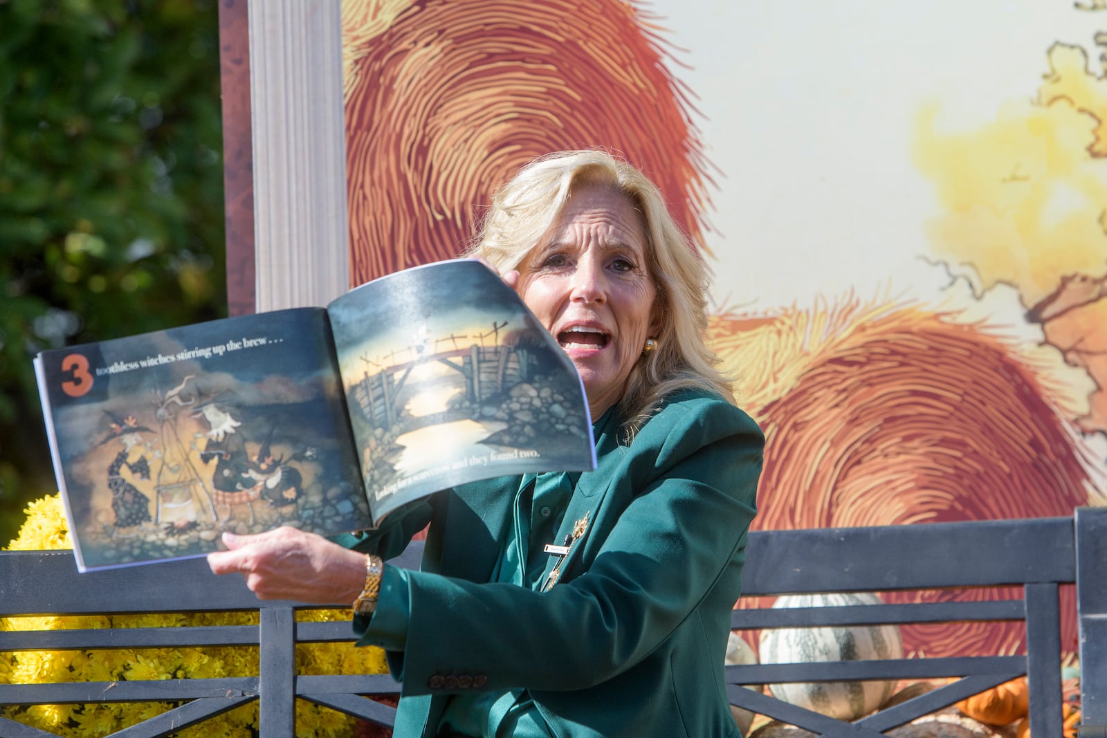 First lady Jill Biden participates in a "Hallo-READ" story-time session by reading the book "10 Spooky Pumpkins" by Gris Grimly to children on the South Lawn of the White House in Washington, Wednesday, Oct. 30, 2024. (AP Photo/Rod Lamkey, Jr.)