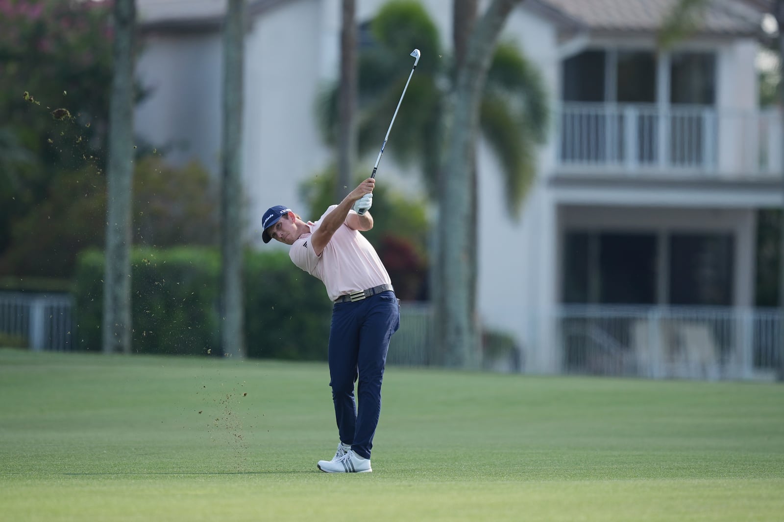 Jacob Bridgeman hits on the 18th hole during the final round of the Cognizant Classic golf tournament, Sunday, March 2, 2025, in Palm Beach Gardens, Fla. (AP Photo/Rebecca Blackwell)