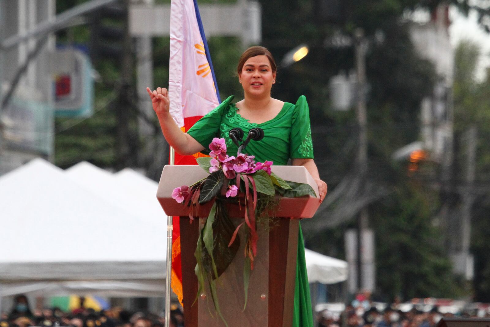 FILE - Philippine Vice President-elect Sara Duterte, daughter of outgoing populist president of the Philippines, delivers her speech during her oath-taking rites in her hometown in Davao city, southern Philippines, on June 19, 2022. (AP Photo/Manman Dejeto)