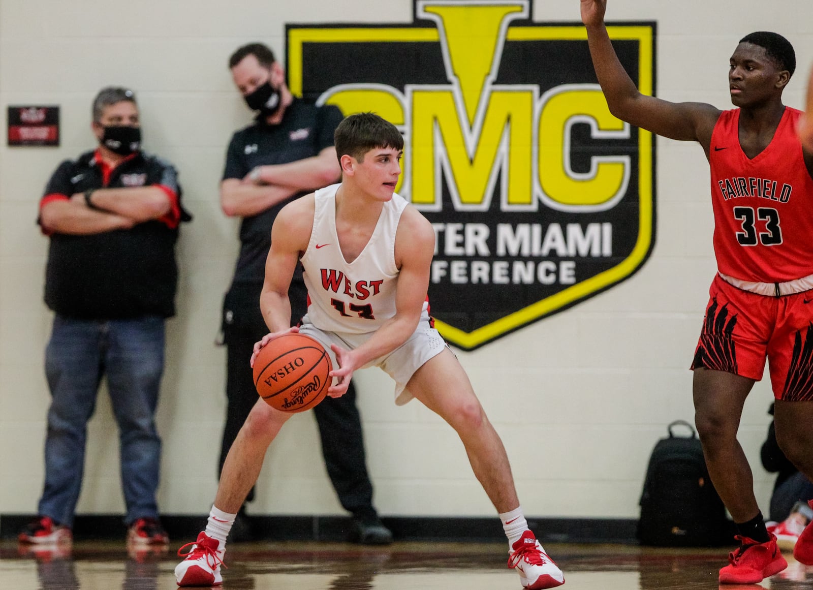 Lakota West's Nathan Dudukovich looks for a pass during their basketball game Friday, February 12, 2021 at Lakota West High School in West Chester Township. Fairfield won 81-76. NICK GRAHAM / STAFF