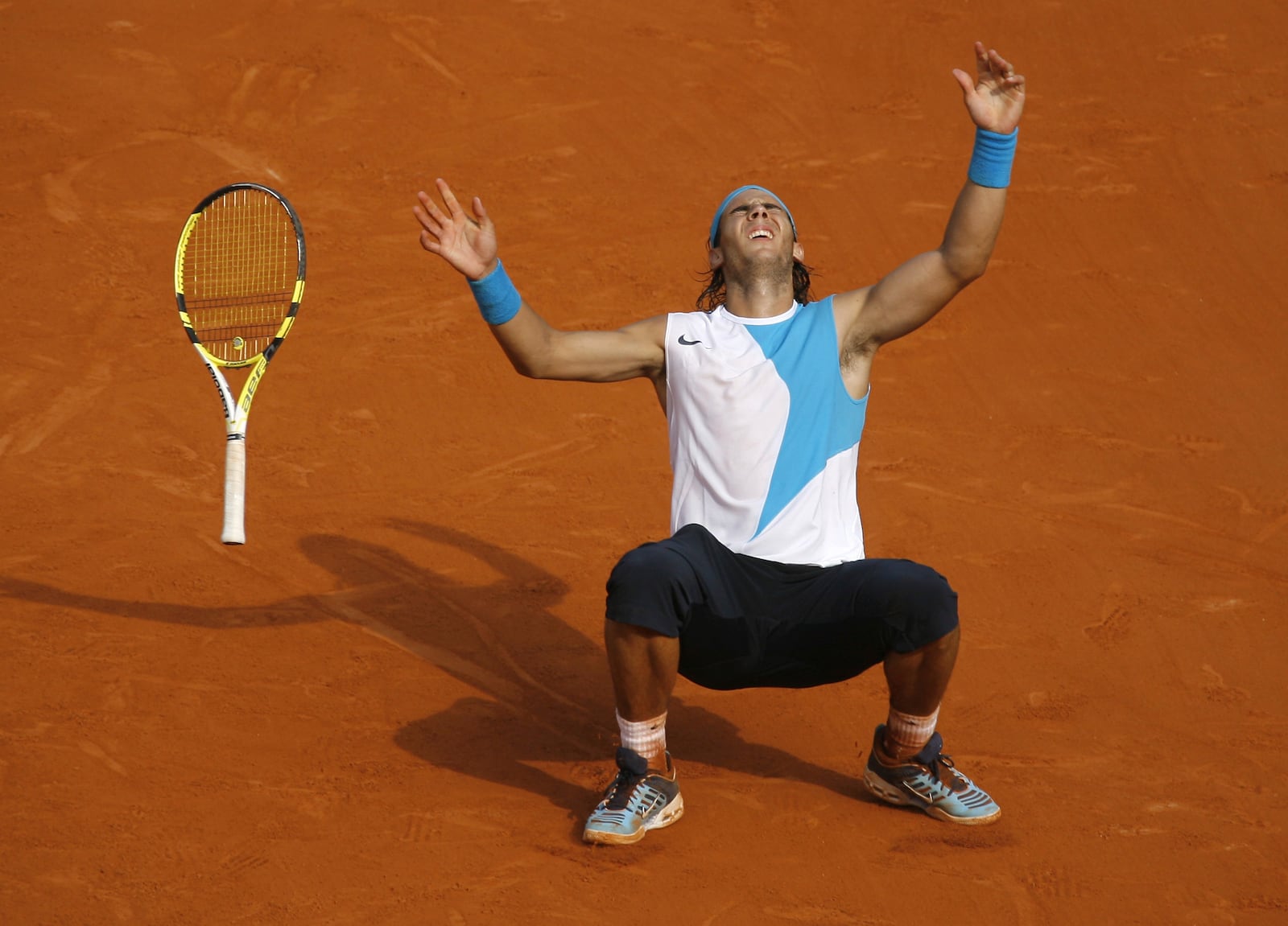 FILE - Spain's Rafael Nadal reacts as he defeats Switzerland's Roger Federer during the men's final match of the French Open tennis tournament at Roland Garros stadium in Paris, Sunday, June 10, 2007. (AP Photo/David Vincent, File)