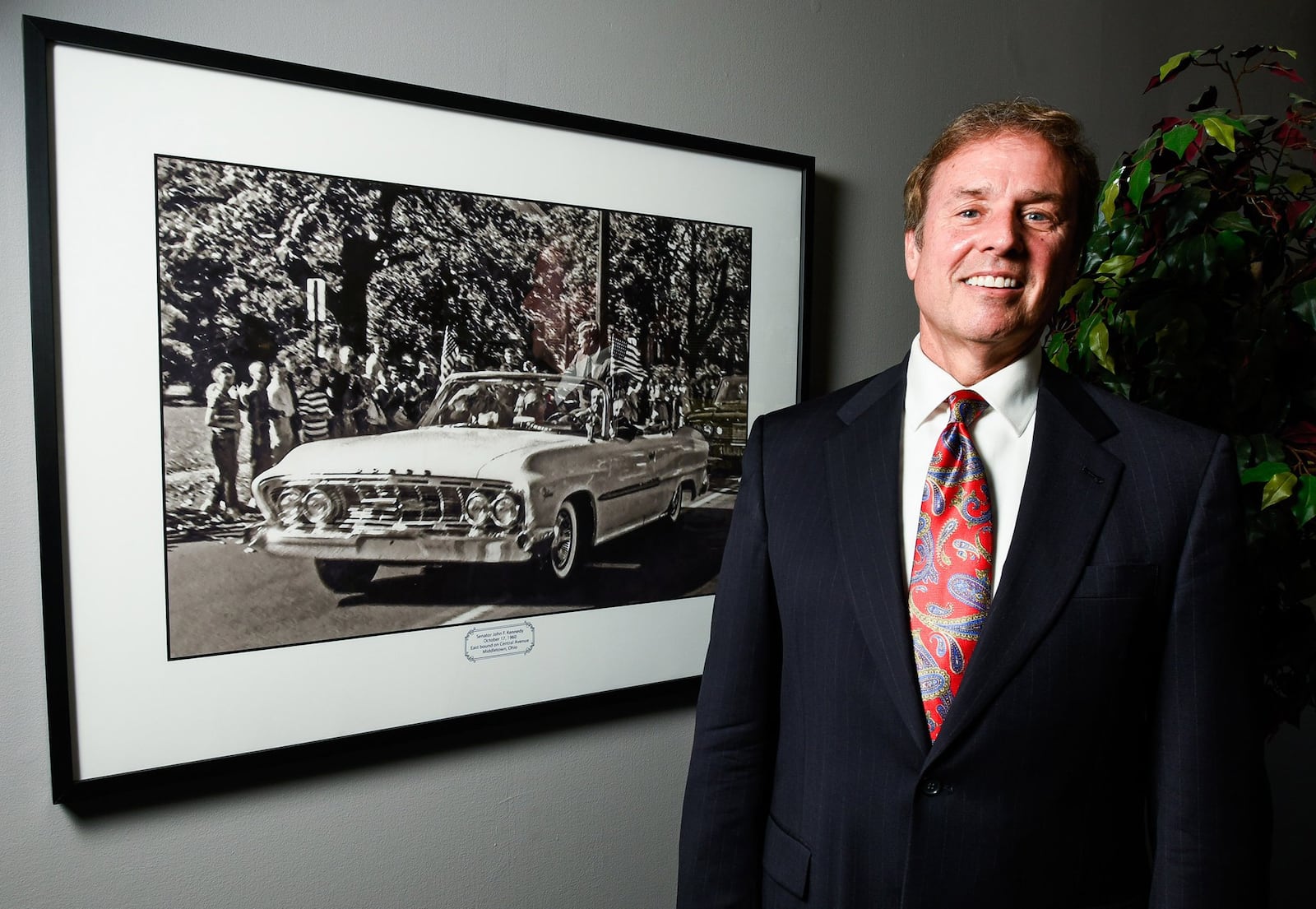 Middletown City Schools superintendent Sam Ison has this photo in his office of John F. Kennedy that was taken when Kennedy visited Middletown as a Senator on Oct. 17, 1960. NICK GRAHAM/STAFF