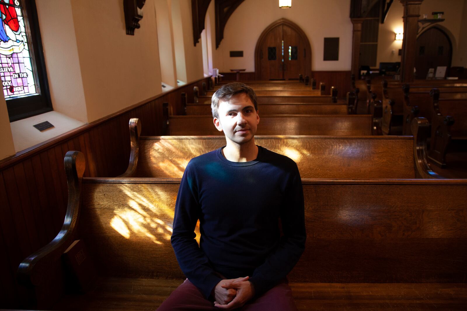 Colin MacKnight, musical director for Trinity Episcopal Cathedral, prepares for his upcoming year-long concert series featuring the works of Johann Sebastian Bach on organ, in Little Rock, Ark., Tuesday, Jan. 21, 2025. (AP Photo/Katie Adkins)