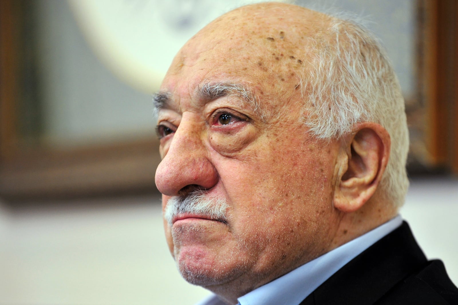 FILE - Turkish Islamic cleric Fethullah Gulen meets members of the media at his compound in Saylorsburg, Pa. in July 2016. (AP Photo/Chris Post, File)