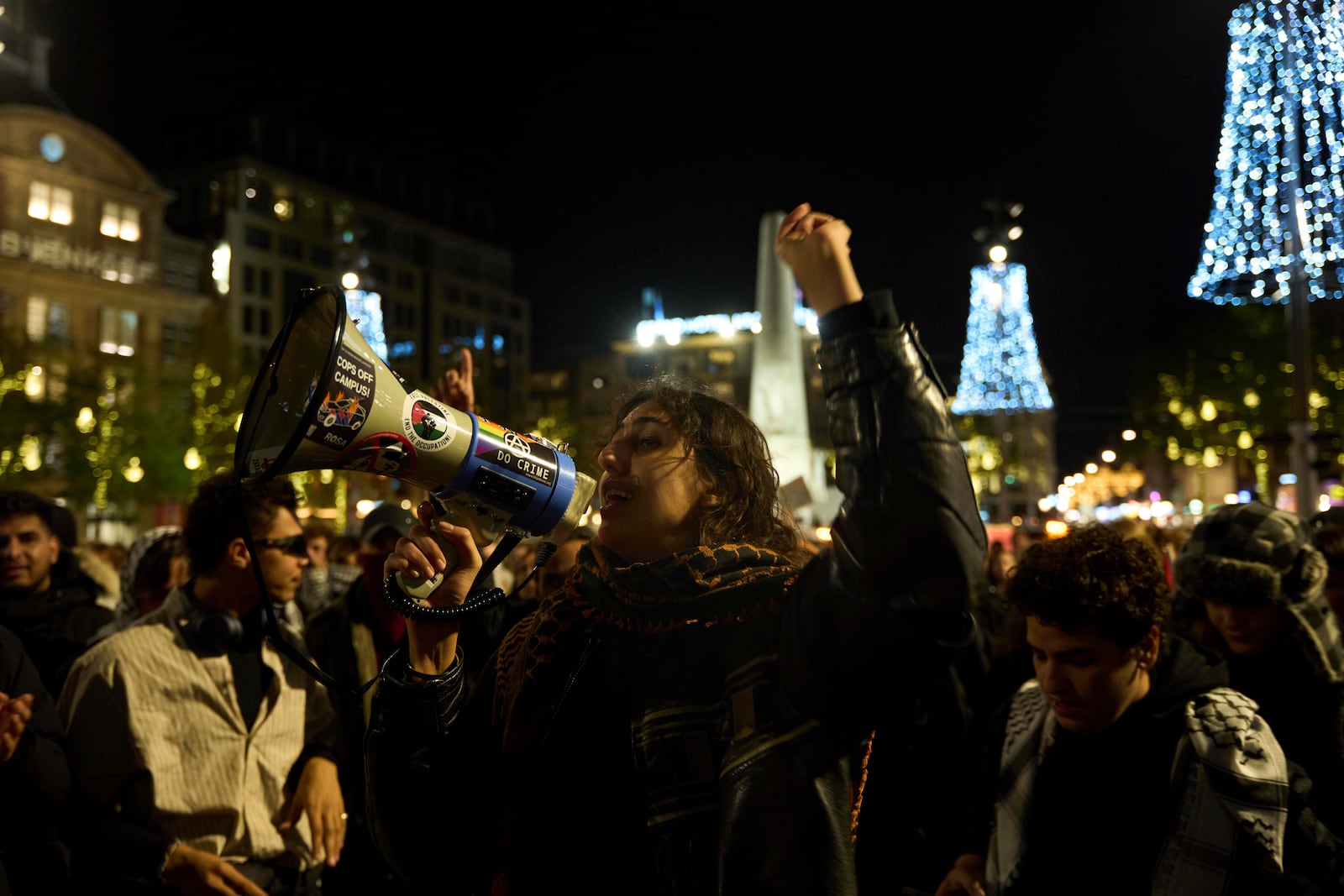 Pro-Palestinian supporters protest in Amsterdam, Netherlands, Wednesday, Nov. 13, 2024, despite a city ban on such gatherings. (AP Photo/Bram Janssen)