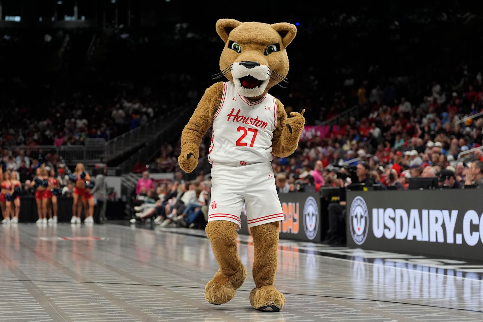 Houston mascot Shasta performs during the second half of an NCAA college basketball game against Arizona for the championship in the Big 12 Conference tournament, Saturday, March 15, 2025, in Kansas City, Mo. (AP Photo/Charlie Riedel)