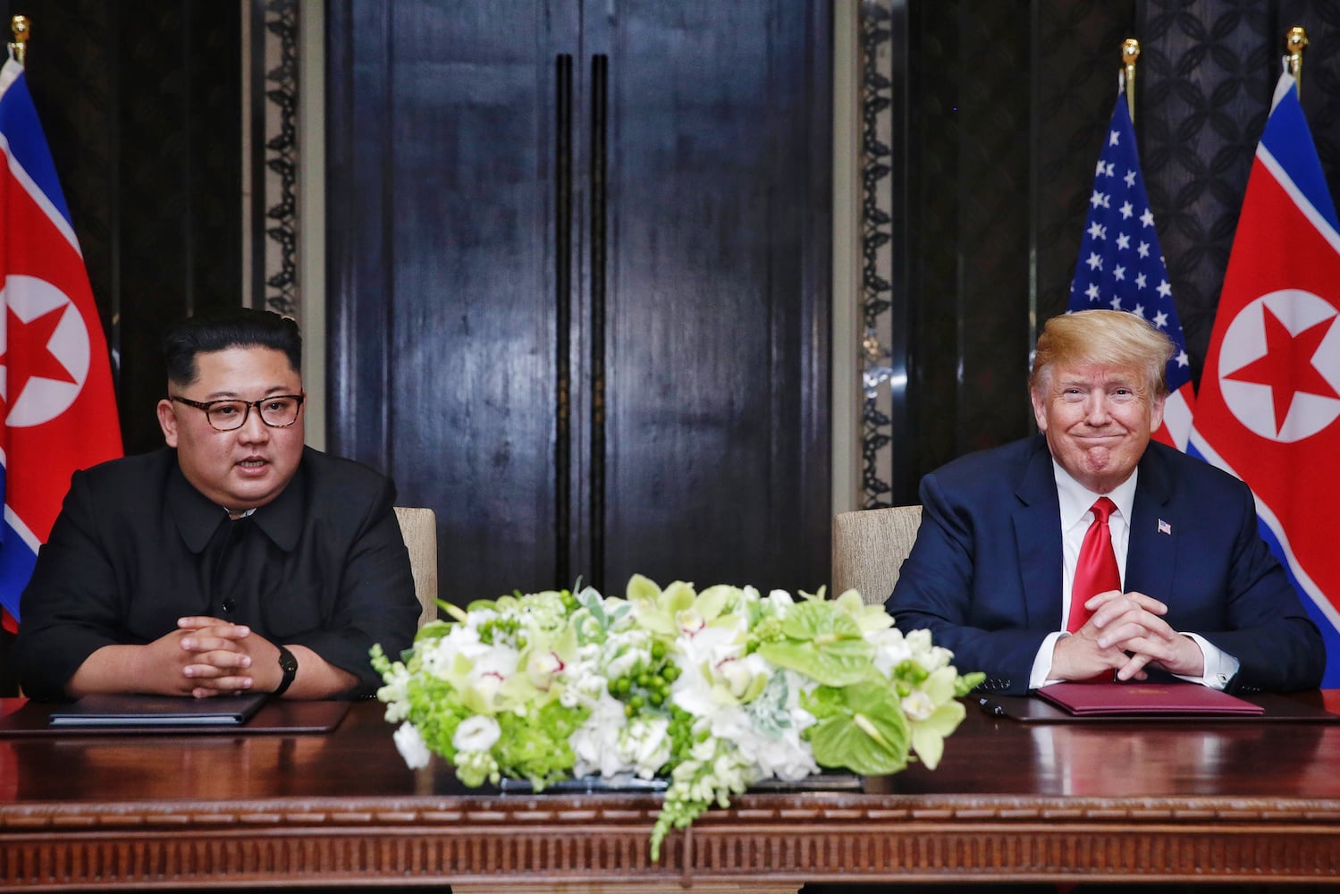 Photos: Trump, Kim Jong Un meet for historic US-North Korea summit