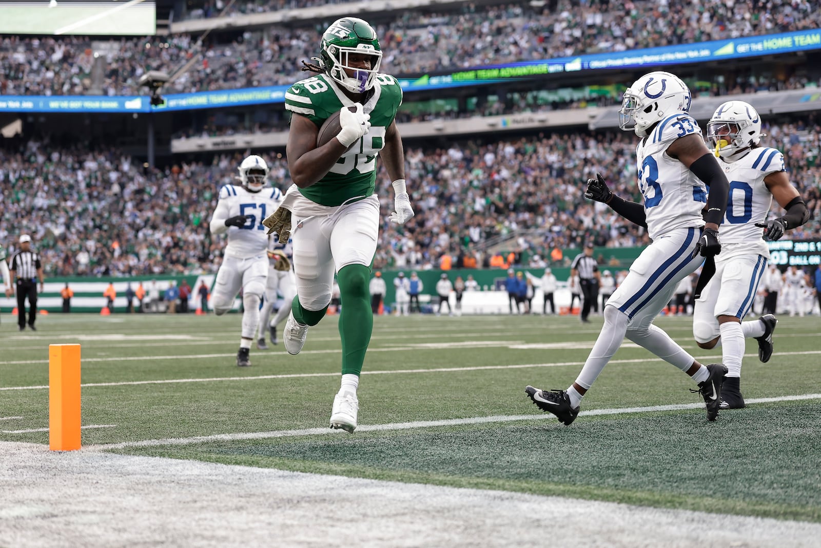 New York Jets tight end Kenny Yeboah (88) crosses the goal line for a touchdown against the Indianapolis Colts during the fourth quarter of an NFL football game, Sunday, Nov. 17, 2024, in East Rutherford, N.J. (AP Photo/Adam Hunger)