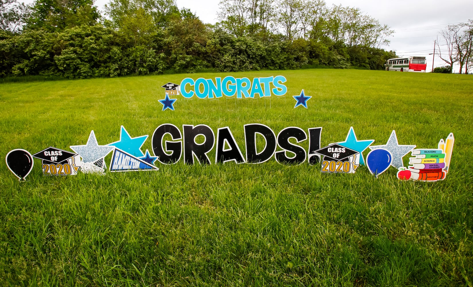 Hamilton High School seniors celebrate graduation at Holiday Auto Theatre drive-in