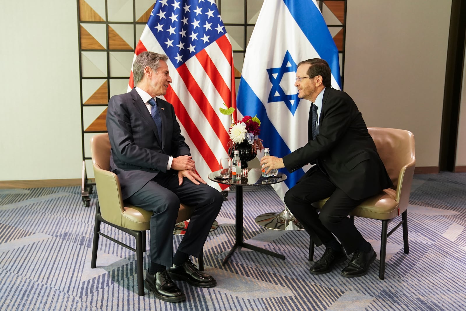 U.S. Secretary of State Antony Blinken, left, meets with Israel's President Isaac Herzog in Tel Aviv, Tuesday, Oct. 22, 2024. (Nathan Howard/Pool via AP)