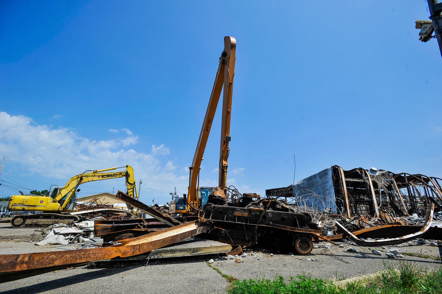 Crews demolish warehouse after massive fire in Hamilton