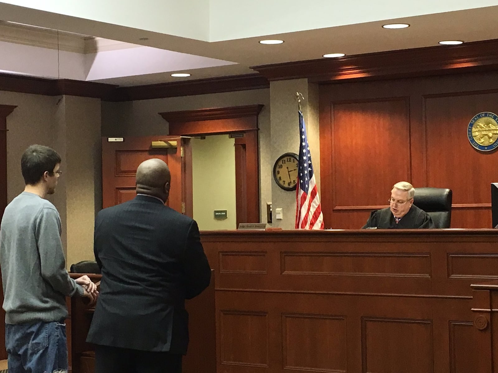 Christopher Sears pleaded guilty to a misdemeanor cruelty to animal charge Tuesday, Jan. 17, in Butler County Common Pleas Court. He is pictured with his attorney David Washington. Judge Noah Powers will sentence Sears next month. LAUREN PACK/STAFF