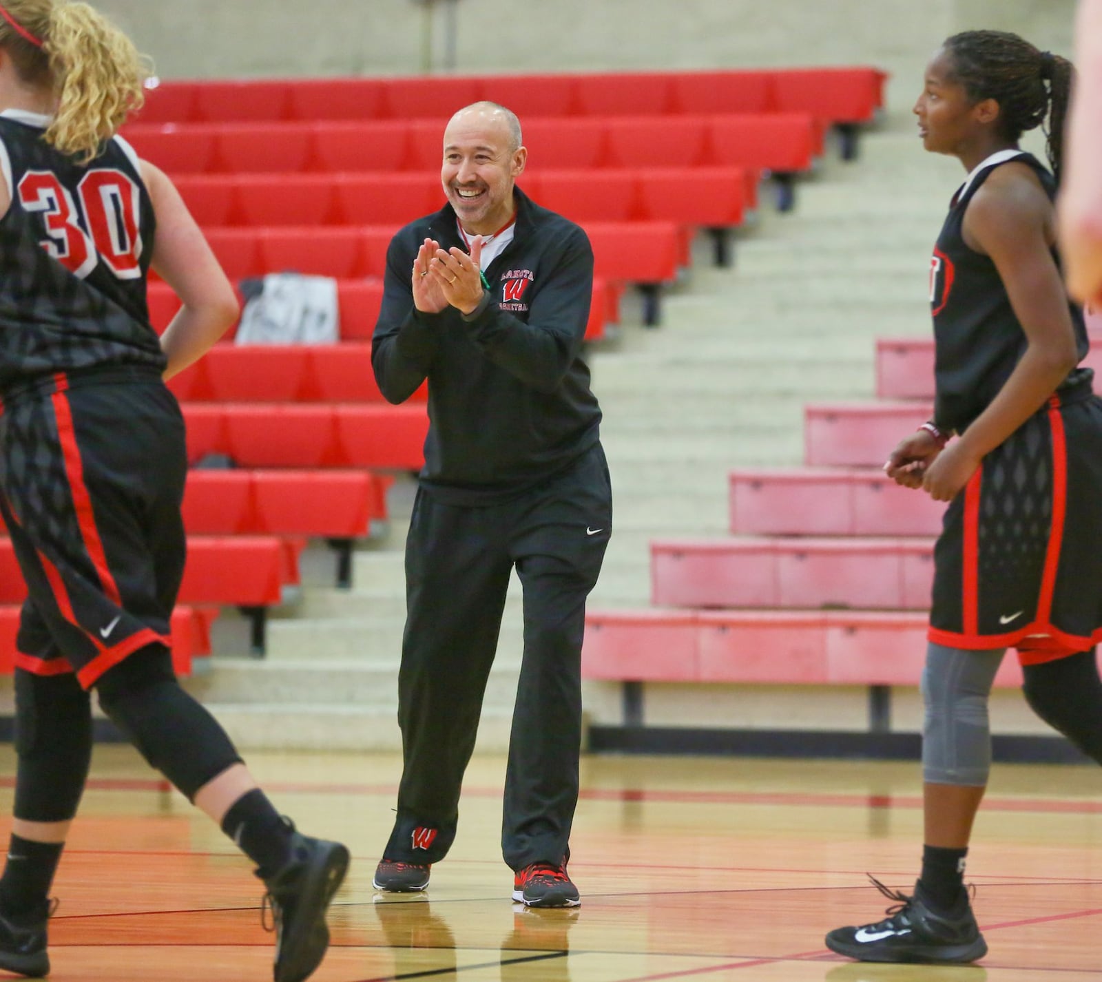 Lakota West coach Andy Fishman smiles during a practice session Nov. 18, 2015, at the school. GREG LYNCH/STAFF