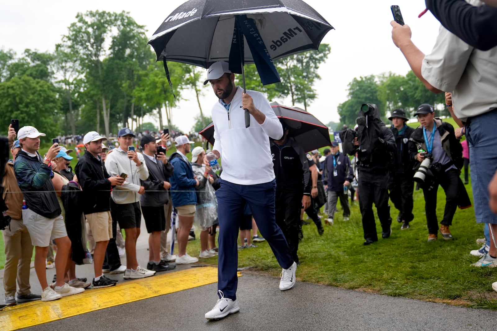 FILE- Scottie Scheffler walks to the tee on the 11th hole during the second round of the PGA Championship golf tournament at the Valhalla Golf Club, Friday, May 17, 2024, in Louisville, Ky. (AP Photo/Jeff Roberson, File)