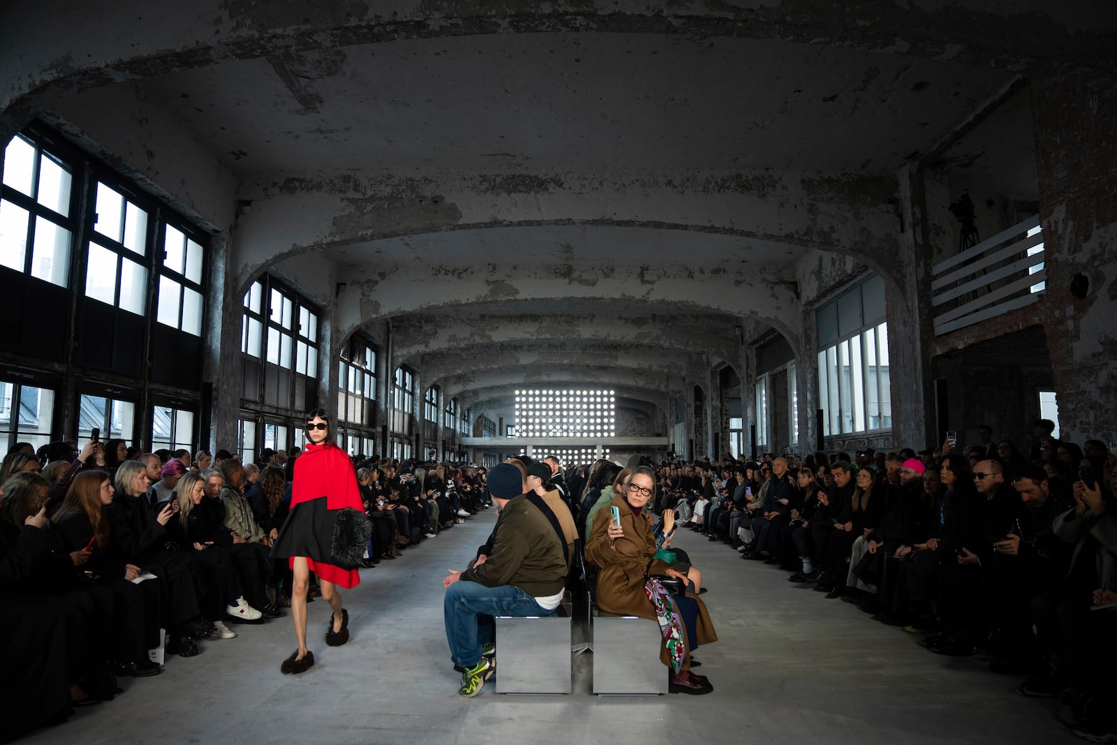 A model wears a creation as part of the Sacai Fall/Winter 2025-2026 Womenswear collection presented in Paris, Monday, March 10, 2025. (Photo by Scott A Garfitt/Invision/AP)