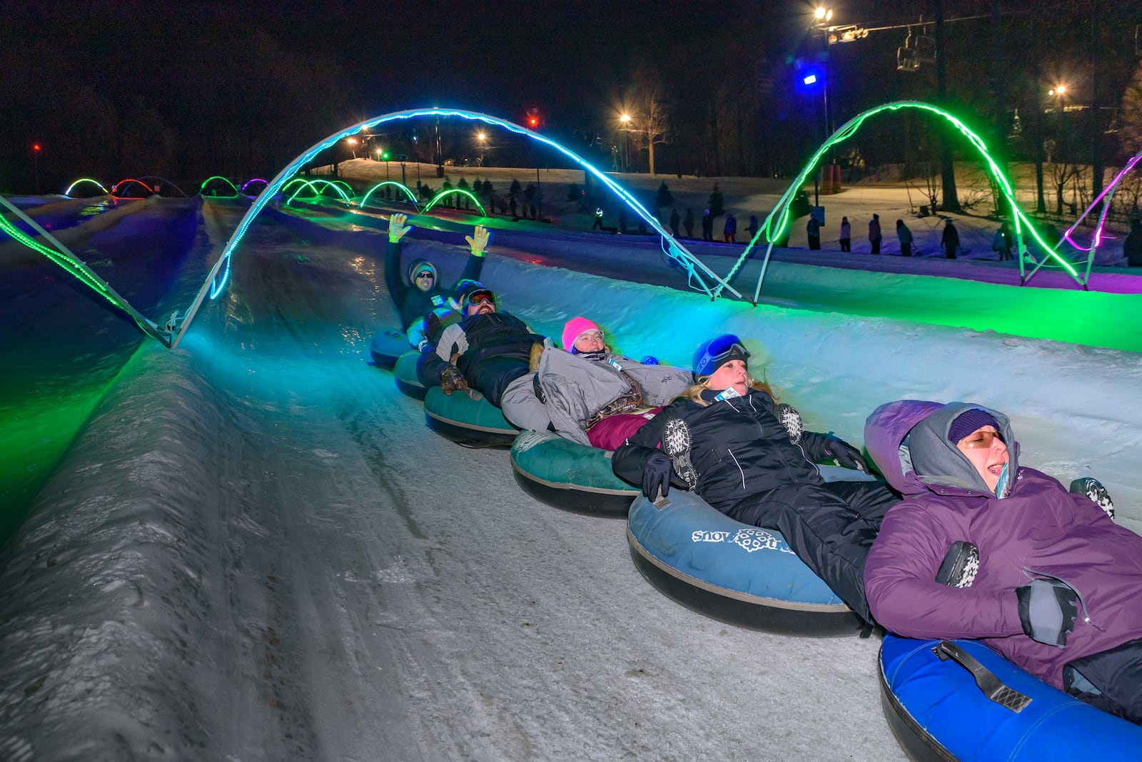 Guests participating in the glow tubing activity at Snow Trails in Mansfield.