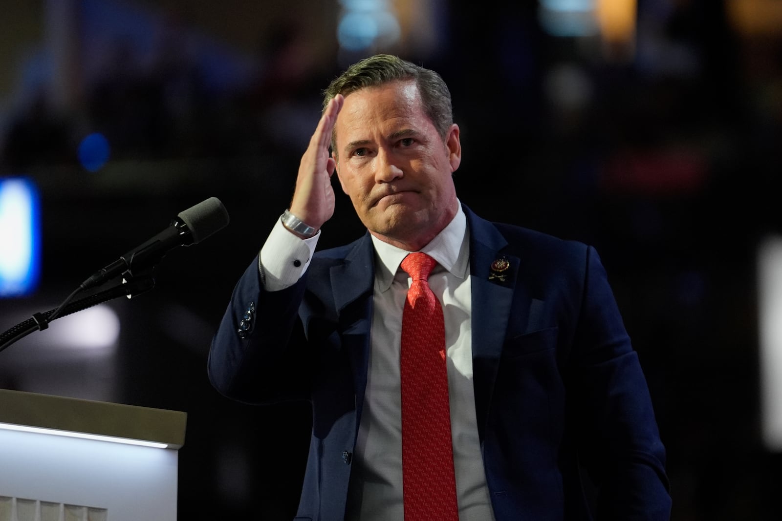 FILE - Rep. Michael Waltz, R-Fla., salutes during the Republican National Convention July 17, 2024, in Milwaukee. (AP Photo/Paul Sancya, File)