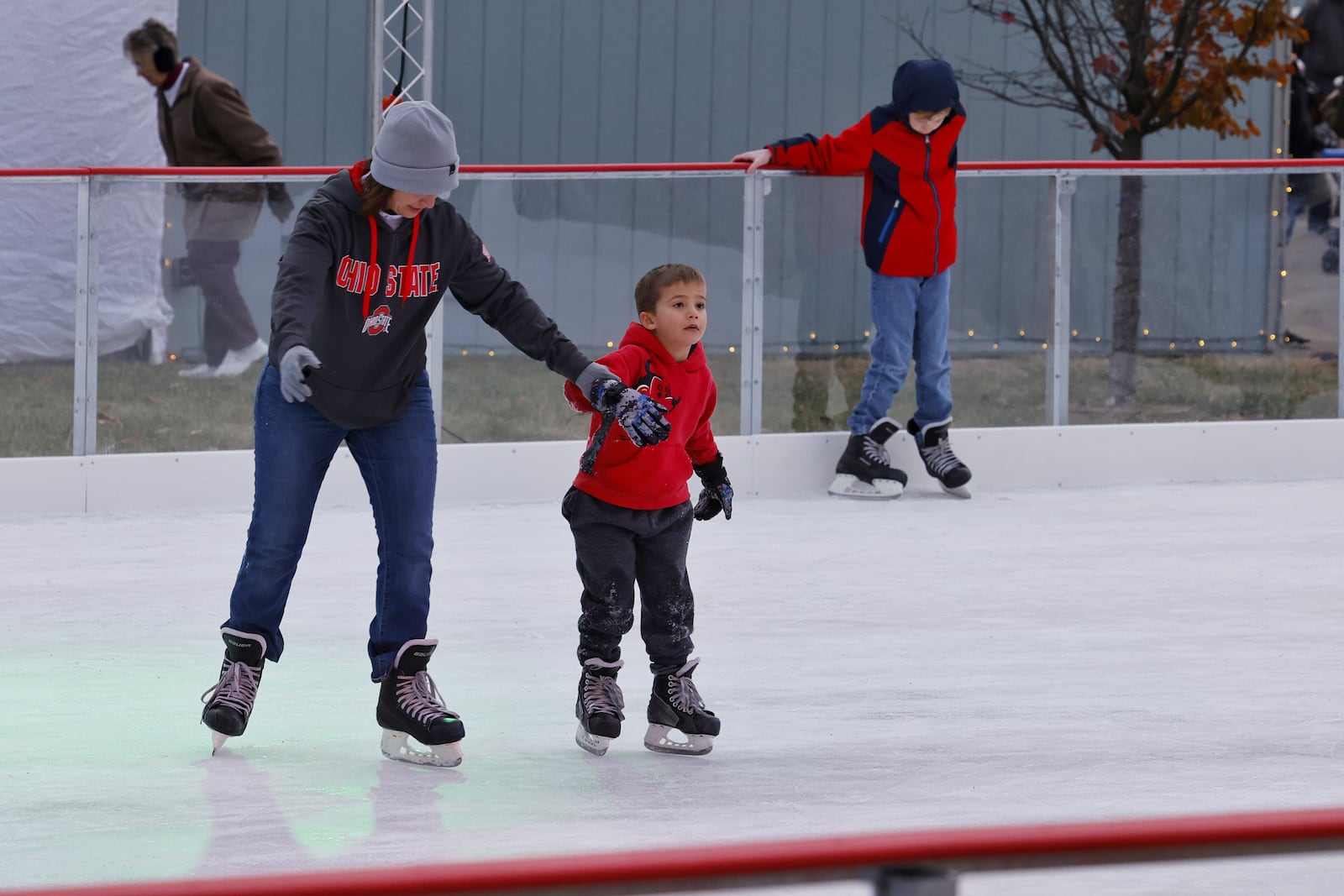 People enjoy the ice skating rink, part of Middletown Holiday Whopla, Saturday, Nov. 27, 2021 in downtown Middletown. NICK GRAHAM / STAFF