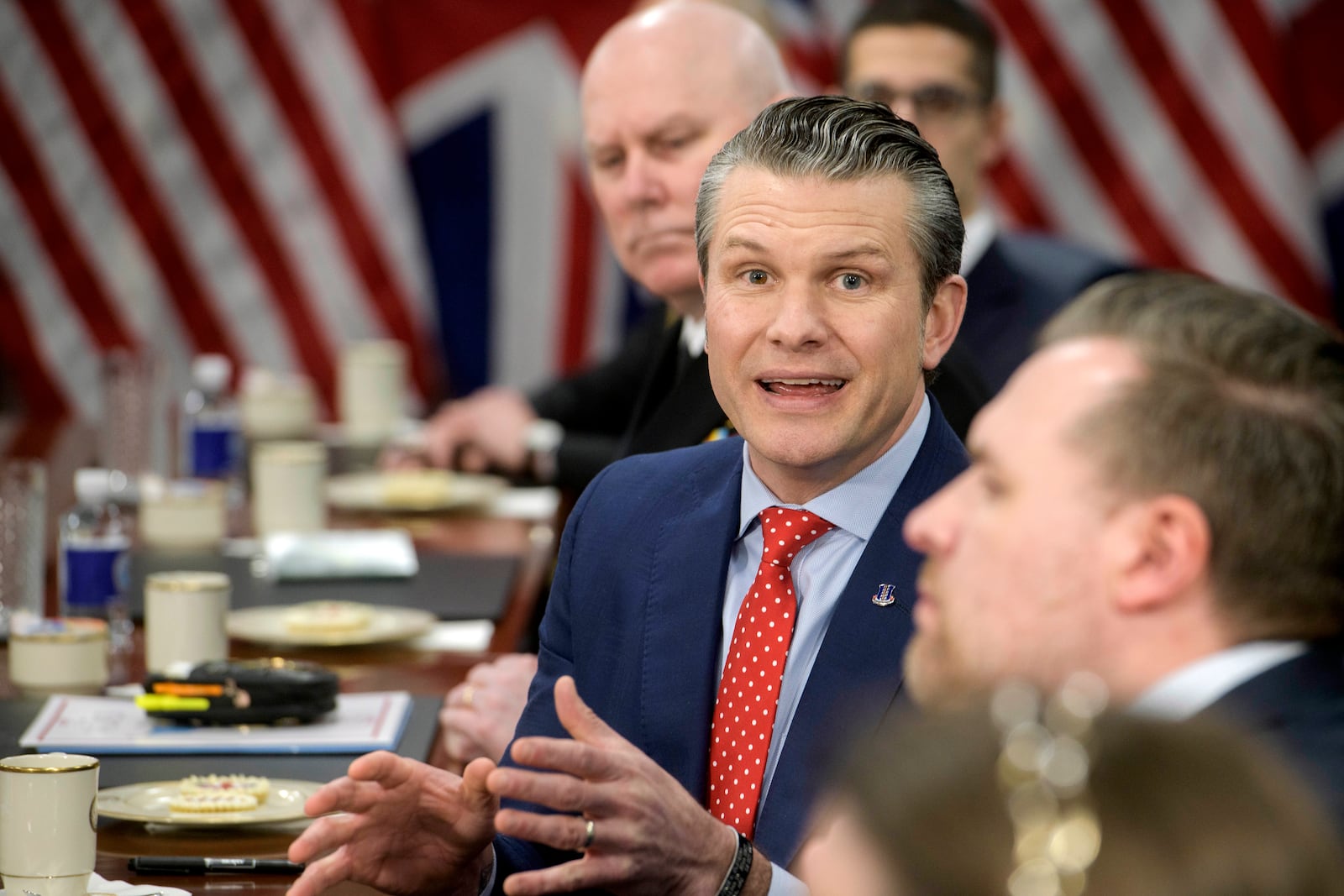 Secretary of Defense Pete Hegseth responds to questions from reporters during a meeting with Britain's Defense Secretary John Healey at the Pentagon, Thursday, March 6, 2025, in Washington. (AP Photo/Rod Lamkey, Jr.)