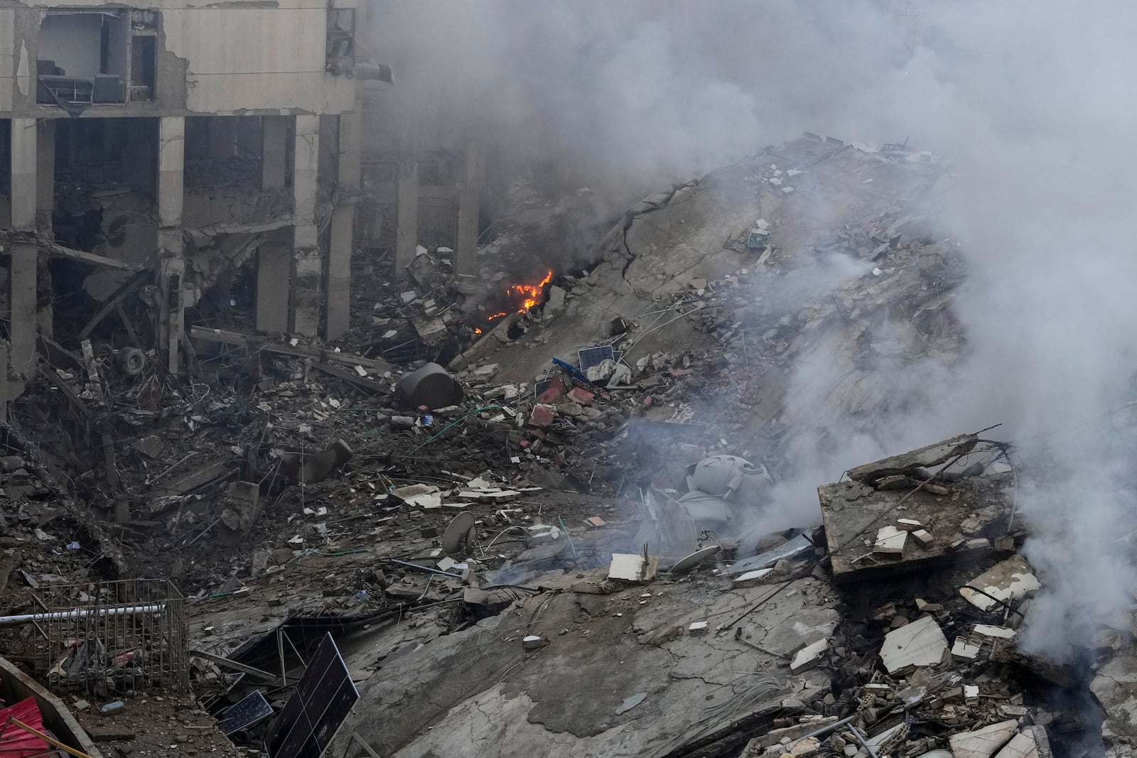 Smoke rises from the site of an Israeli airstrike in Beirut's southern suburb, Lebanon, Tuesday, Oct. 1, 2024. (AP Photo/Hassan Ammar)