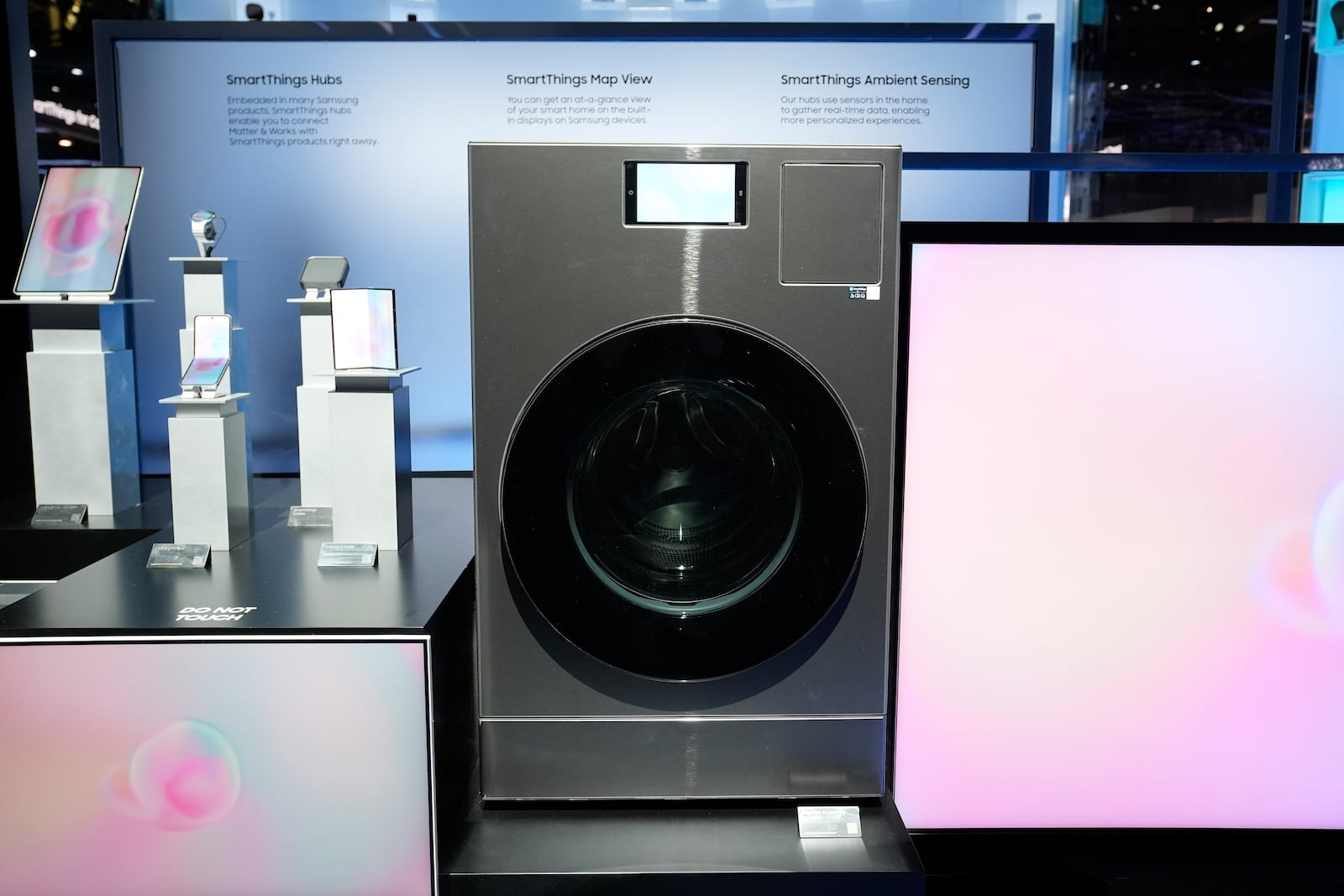 The Samsung Bespoke AI Washing Machine is displayed at a Samsung booth during the CES tech show Wednesday, Jan. 8, 2025, in Las Vegas. (AP Photo/Abbie Parr)