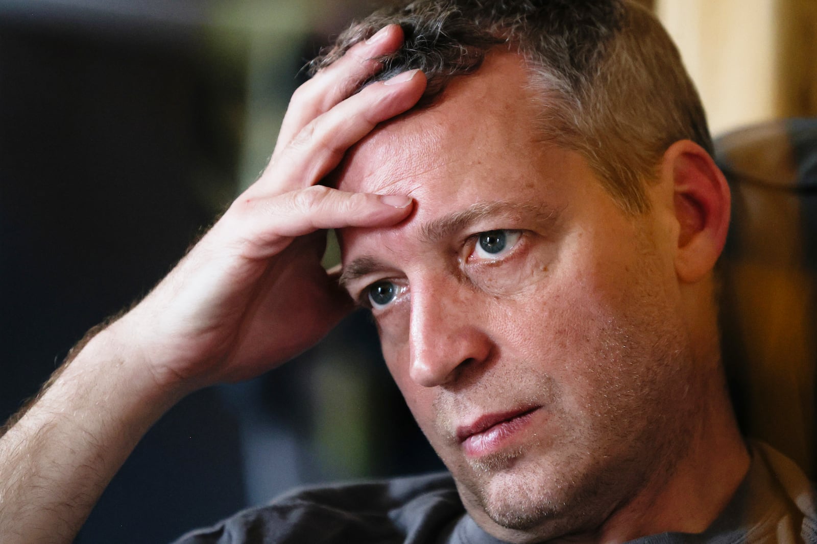 Jake Heinrichs watches television during his infusion treatment with an experimental anti-amyloid Alzheimer's drug in New York, on Wednesday, March 12, 2025. (AP Photo/Heather Khalifa)