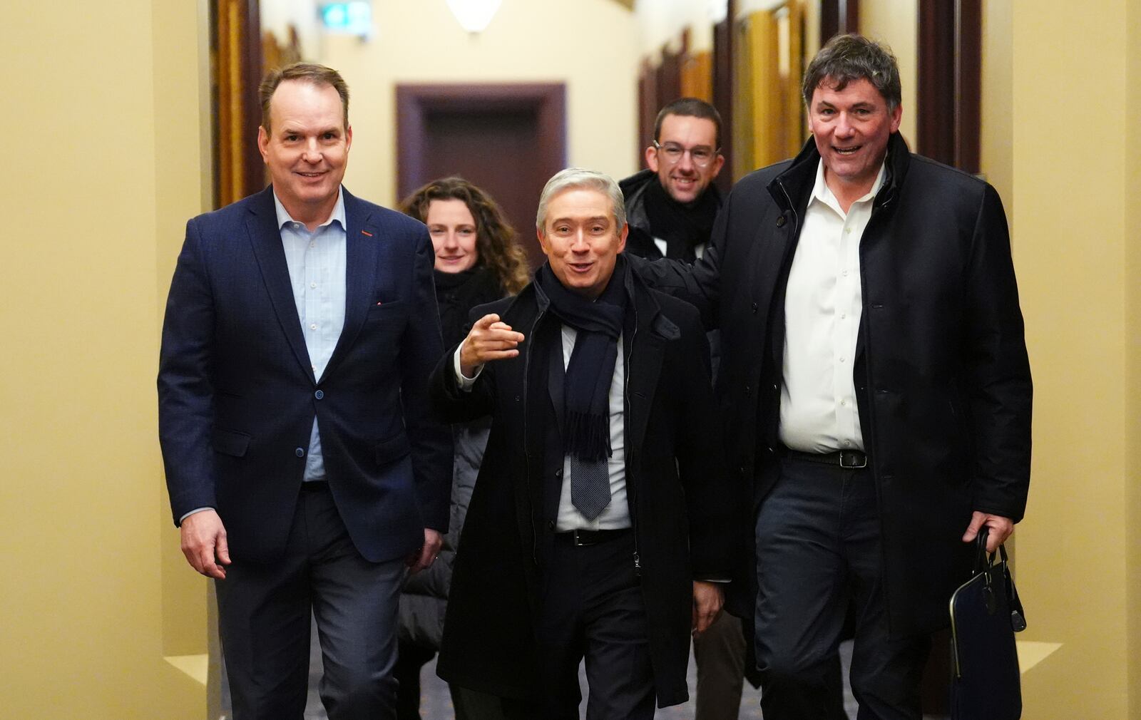 Employment Minister Steven MacKinnon, left to right, Innovation, Science and Industry Minister Francois-Philippe Champagne and Finance Minister Dominic LeBlanc arrive for a Liberal caucus meeting in Ottawa on Wednesday, Jan. 8, 2025. (Sean Kilpatrick/The Canadian Press via AP)