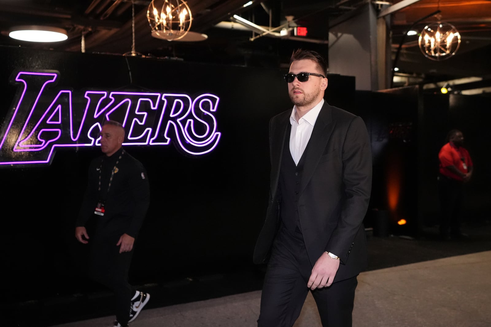 Los Angeles Lakers guard Luka Doncic arrives before an NBA basketball game against the Utah Jazz, Monday, Feb. 10, 2025, in Los Angeles. (AP Photo/Mark J. Terrill)