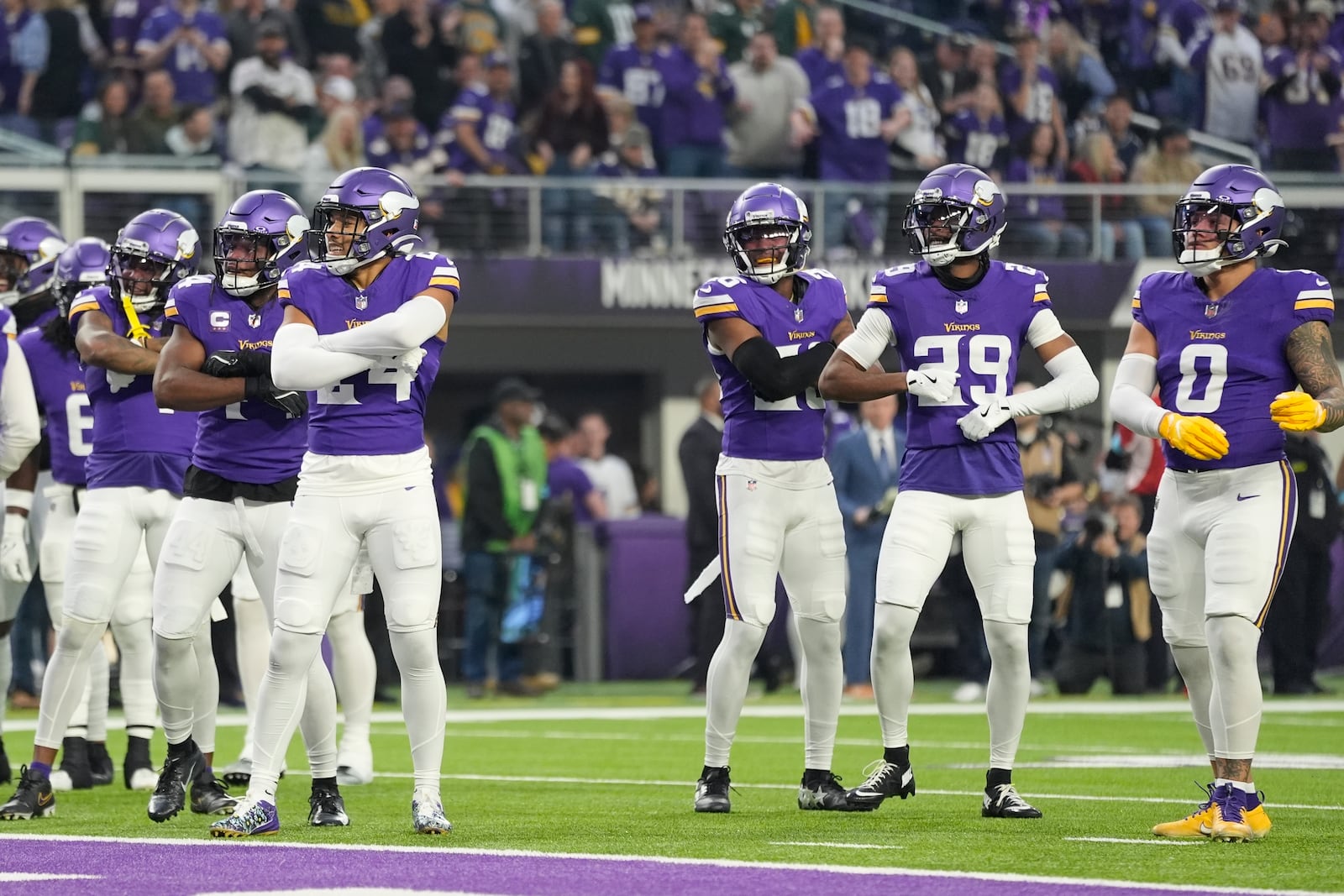 Minnesota Vikings' Camryn Bynum celebrates his fumble recovery with teammates during the first half of an NFL football game against the Green Bay Packers Sunday, Dec. 29, 2024, in Minneapolis. (AP Photo/Abbie Parr)