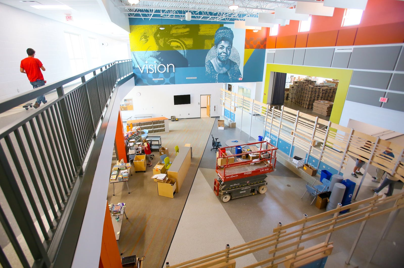 Workers continue to put the final touches on the new Compass Elementary School in Fairfield, which opens this fall. GREG LYNCH / STAFF