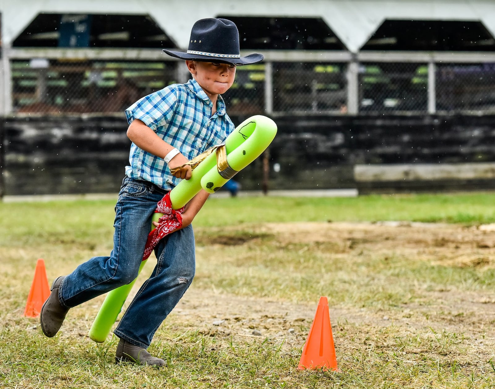 Conner Franke, 6, rides a pool noodle horse around an obstacle course during the 2017 Butler County Fair. The Butler County Fair will run in Hamilton from July 22-28 in 2018. 