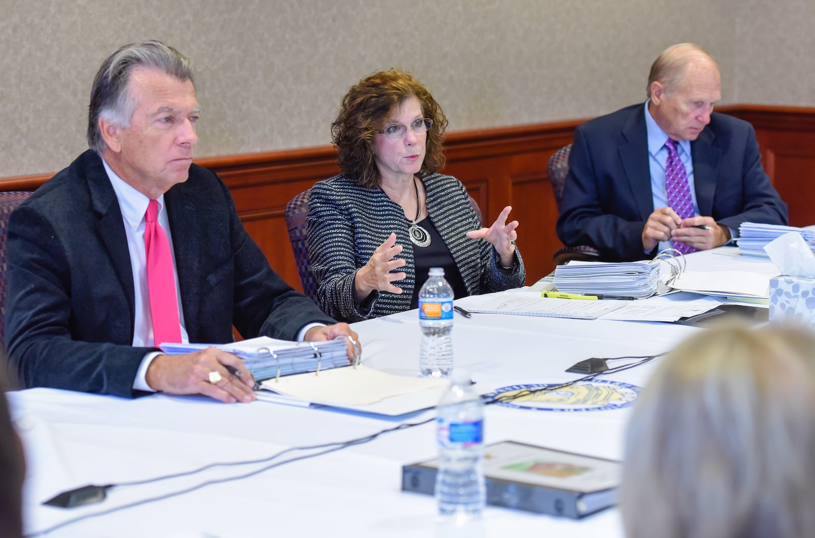 Butler County Commissioners T.C. Rogers, left, Cindy Carpenter and Donald Dixon sit in budget talks meetings Monday, Oct. 12 at the Butler County Government Services Center in Hamilton. NICK GRAHAM/STAFF