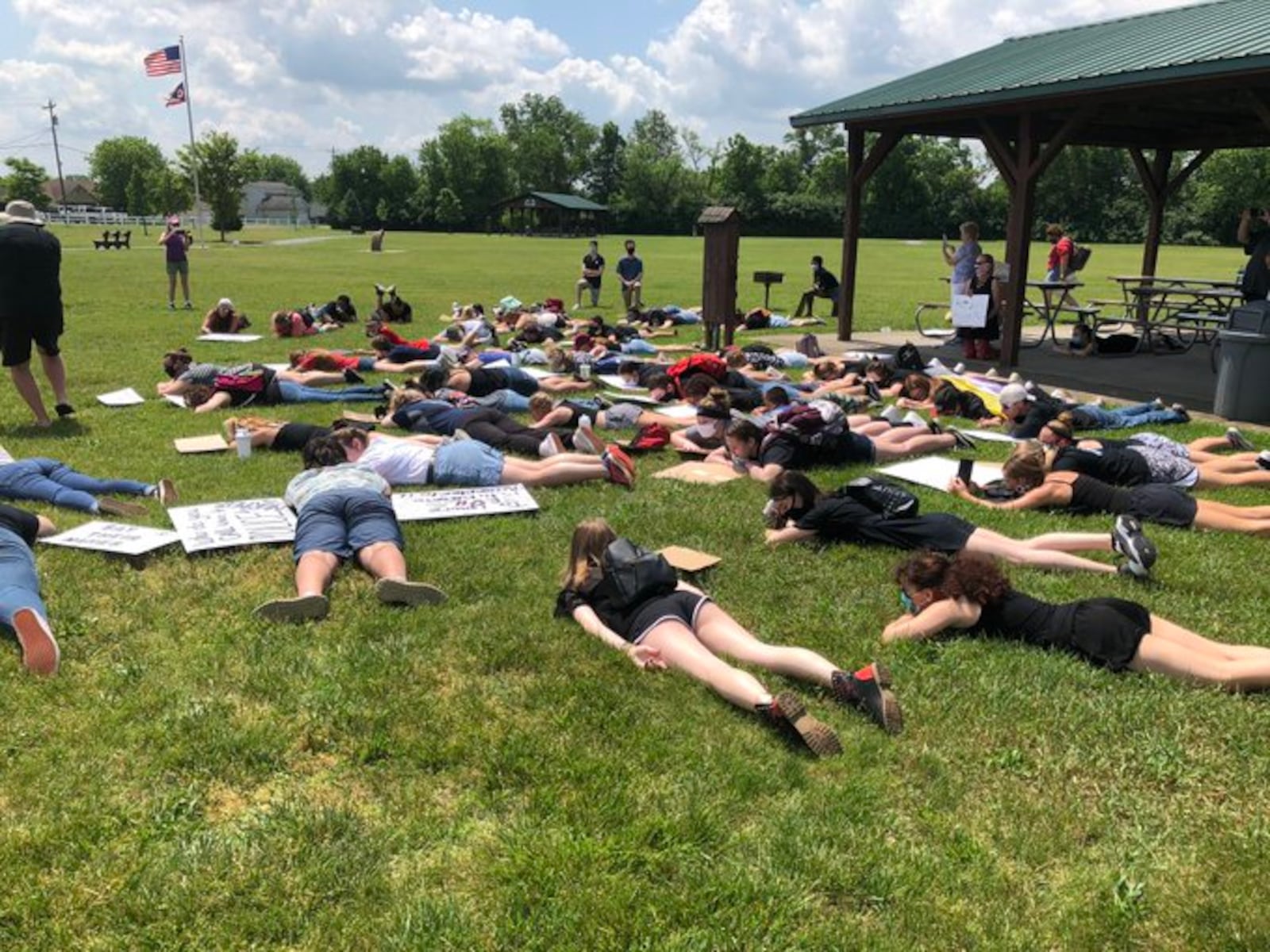 Protesters in Carlisle laid on ground for eight minutes at Roscoe Park on Saturday, June 6, 2020, in protest after the death of George Floyd in Minnesota. RICK McCRABB / STAFF